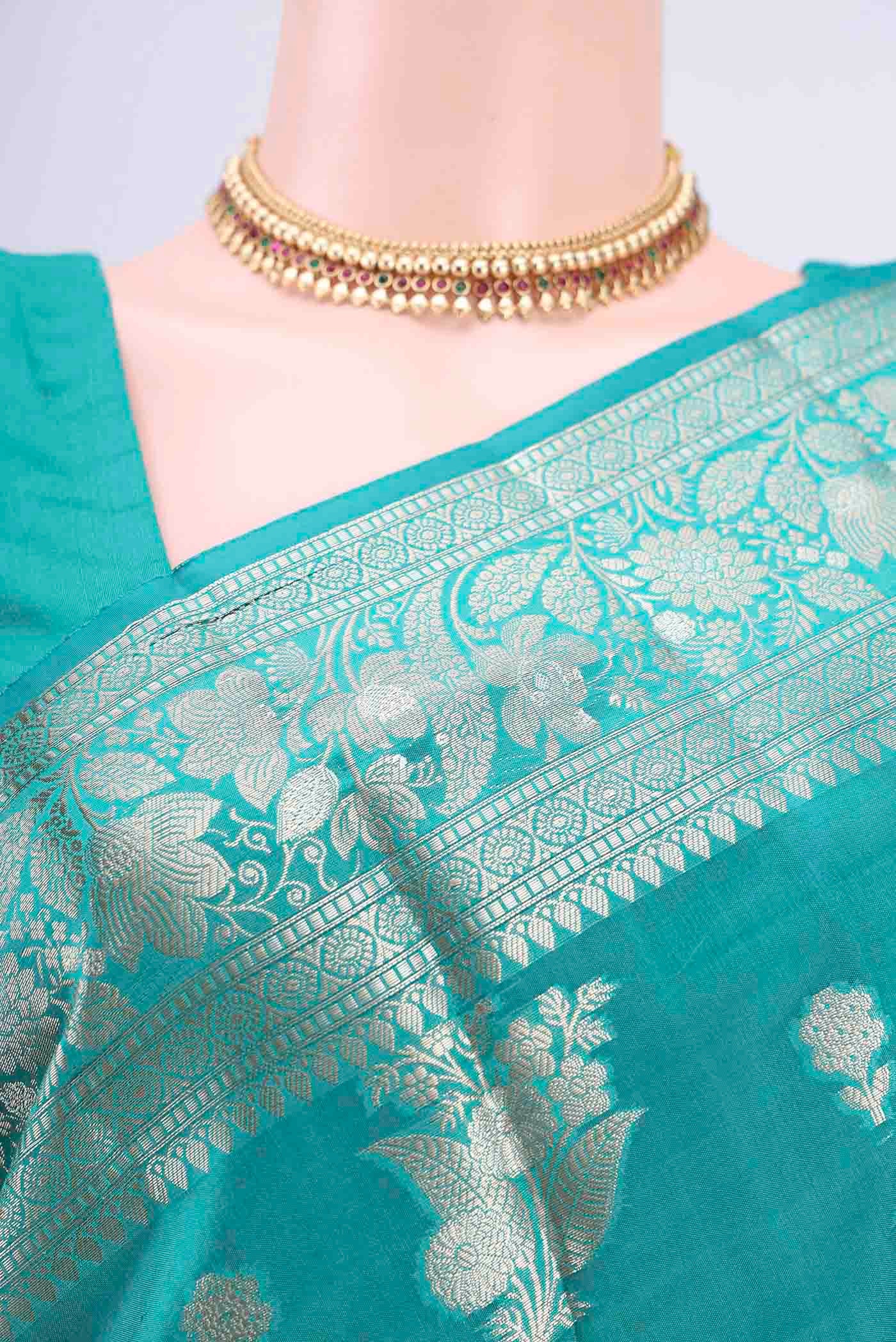 Border image of Turquoise Banarasi Raw Silk Saree with Zari Butta on the body and Zari Border