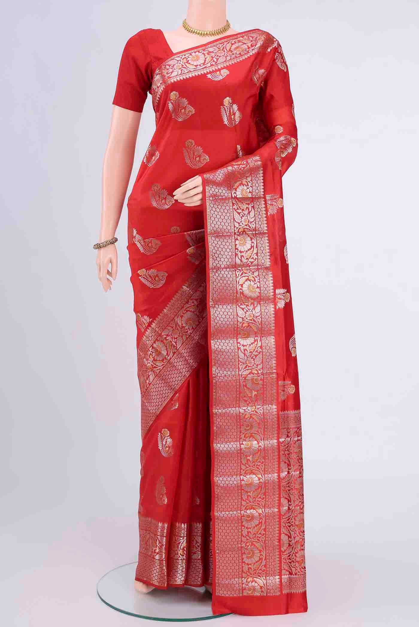 Imperial Red Banarasi Raw Silk Saree with Zari Butta on the body and Zari Border displayed on a mannequin