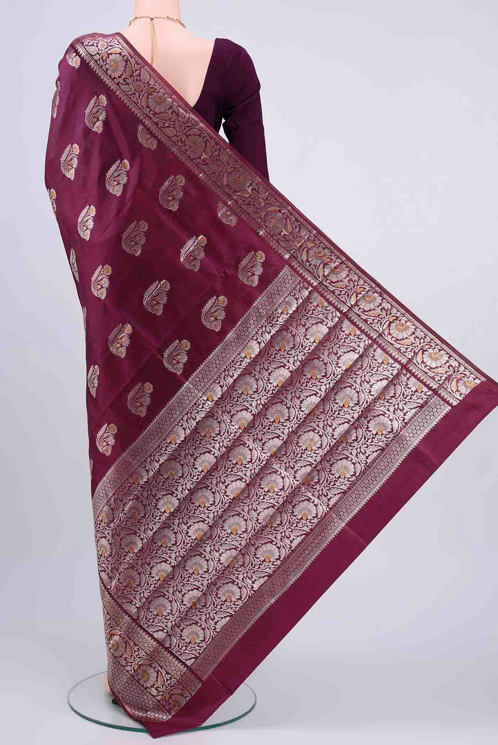 Flat view of Dark Mauve Banarasi Raw Silk Saree with Zari Butta on the body and Zari Border