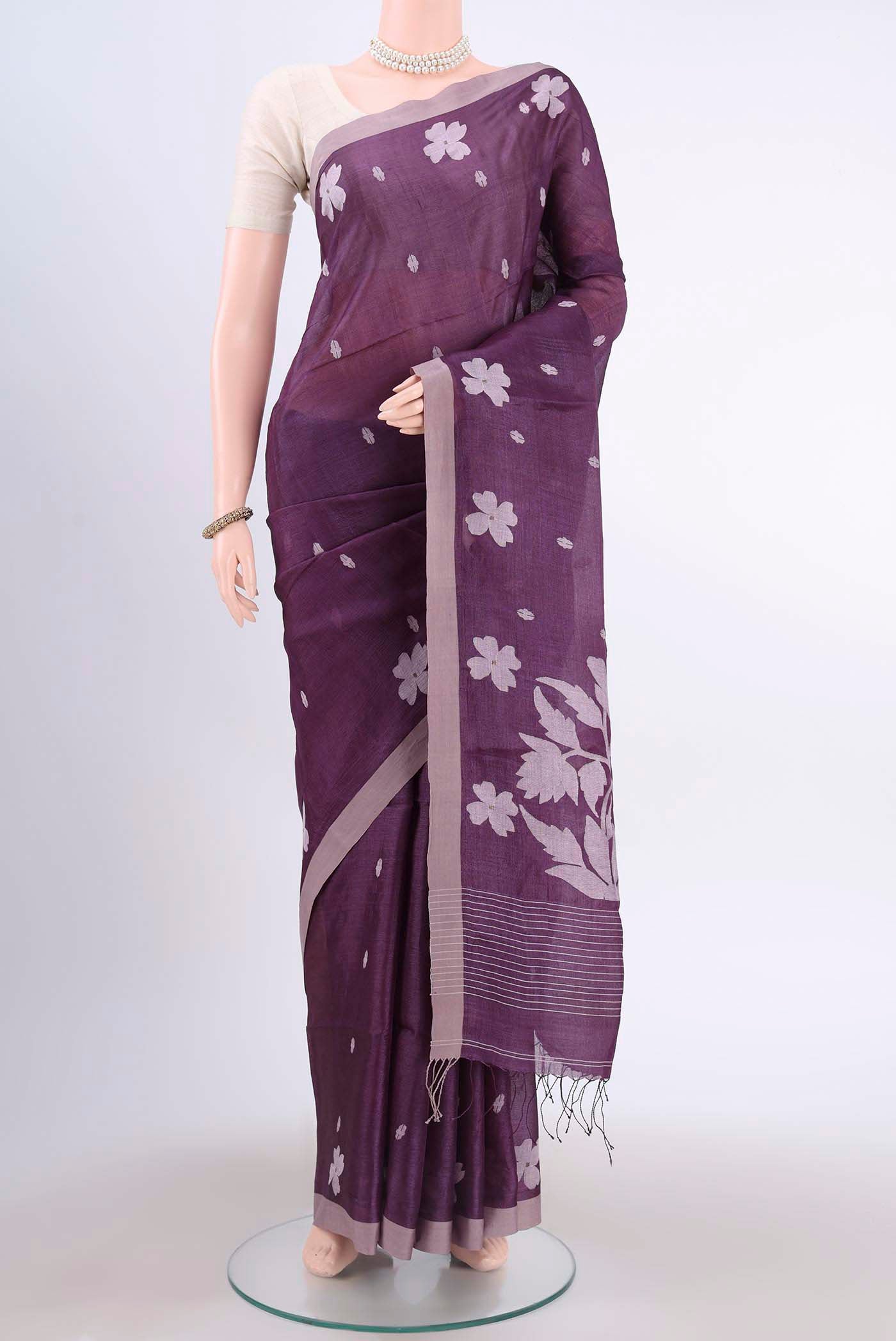 Dark Mauve Tussar Silk Saree with Jamdani on the body and Plain Border displayed on a mannequin