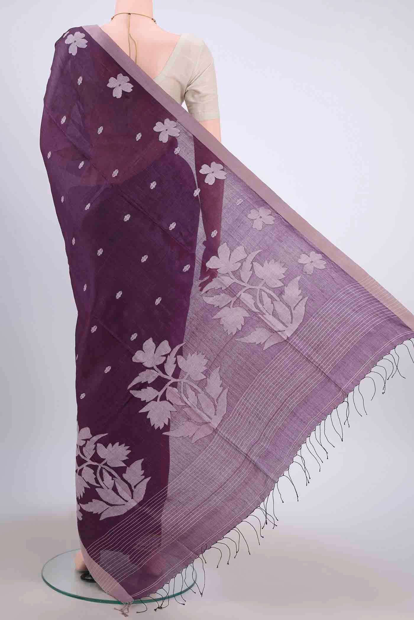 Flat view of Dark Mauve Tussar Silk Saree with Jamdani on the body and Plain Border