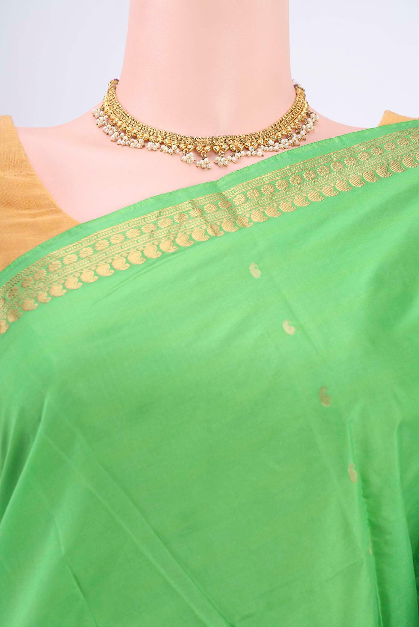 Border image of Parrot Green Blended Bangalore Silk Saree with Zari Butta on the body and Zari Border