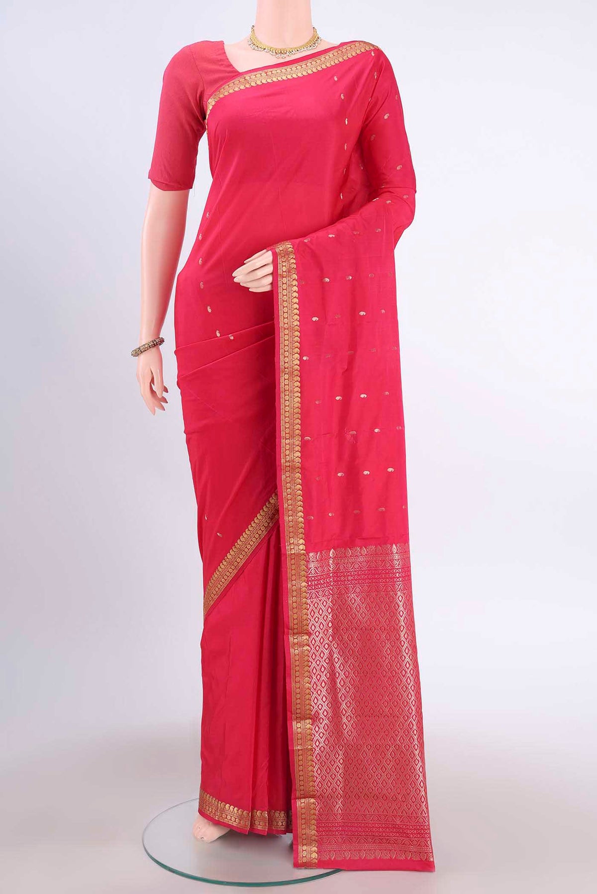 Red Blended Bangalore Silk Saree with Zari Butta on the body and Zari Border displayed on a mannequin