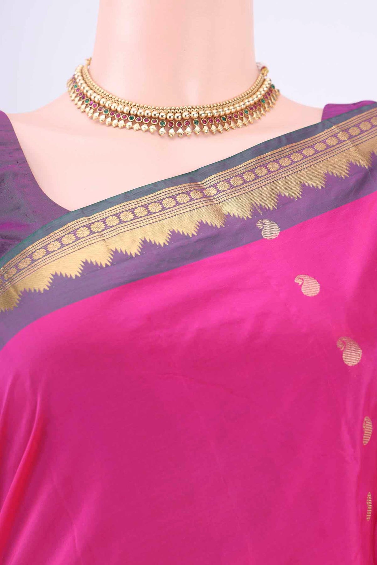 Border image of Rani Pink Blended Bangalore Silk Saree with Zari Butta on the body and Temple Border