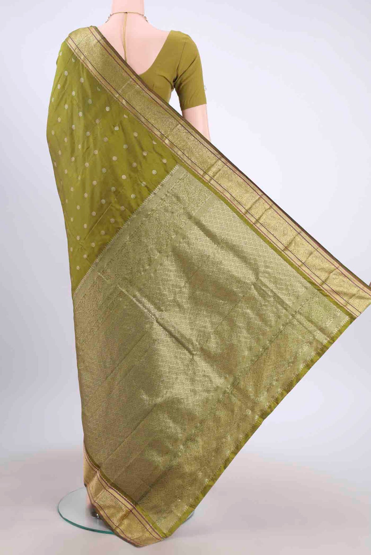 Flat view of Mehandi Green Blended Bangalore Silk Saree with Zari Butta on the body and Zari Border