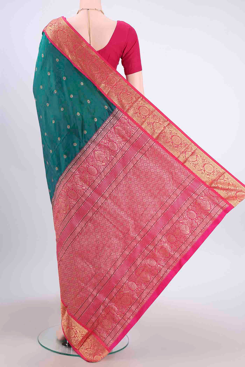 Flat view of Bottle Green Blended Bangalore Silk Saree with Zari And Thread Butta on the body and Zari Border