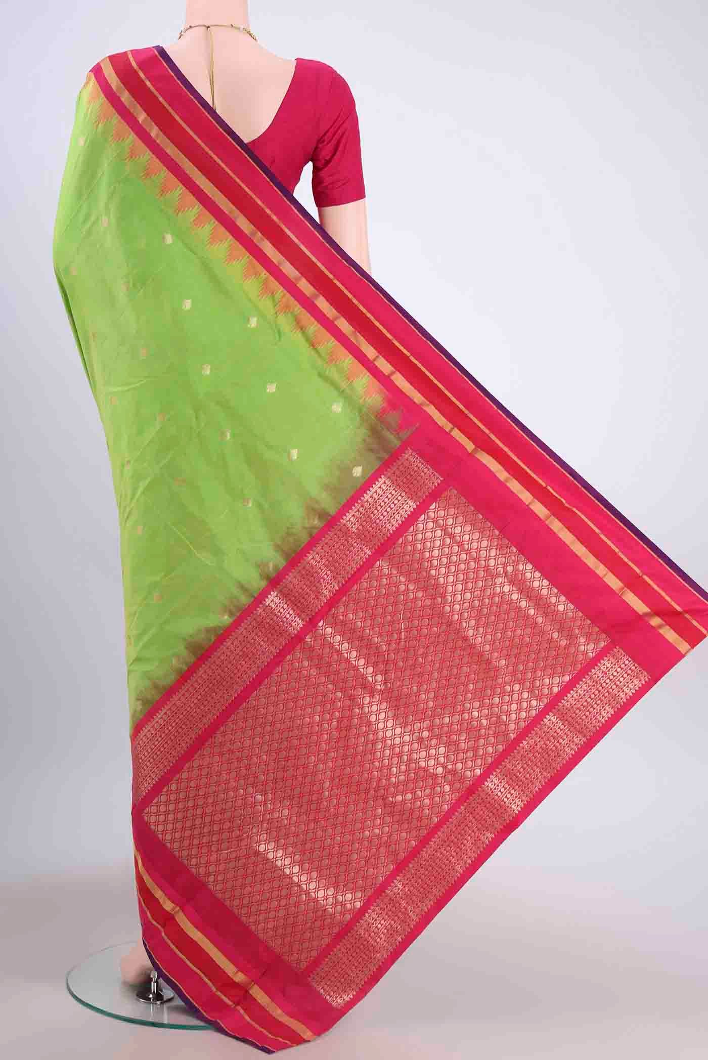 Flat view of Parrot Green Dual Tone Blended Bangalore Silk Saree with Zari Butta on the body and Temple Border