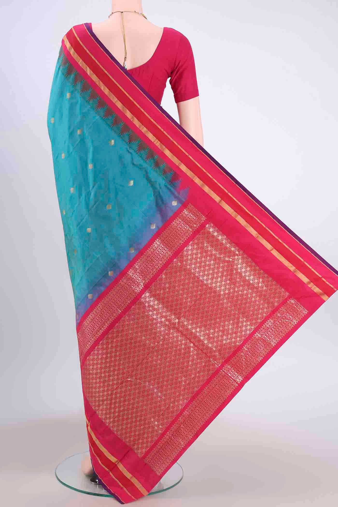 Flat view of Blue Blended Bangalore Silk Saree with Zari Butta on the body and Temple Border