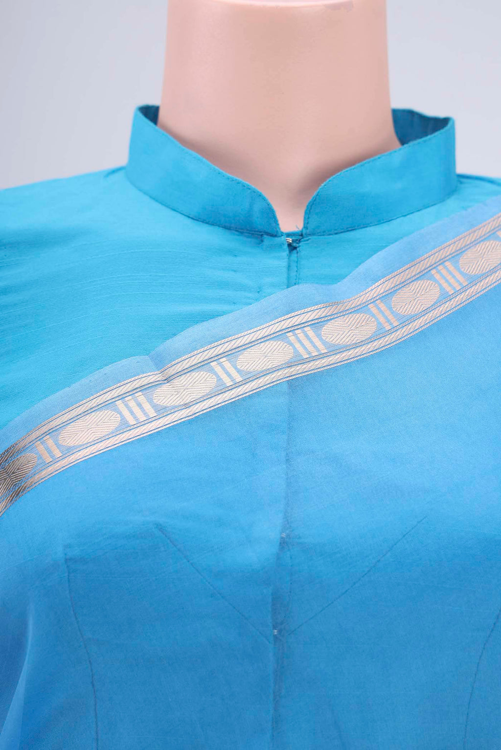 Border image of Blue Organza Silk Saree with Zari Butta on the body and Zari Border. 