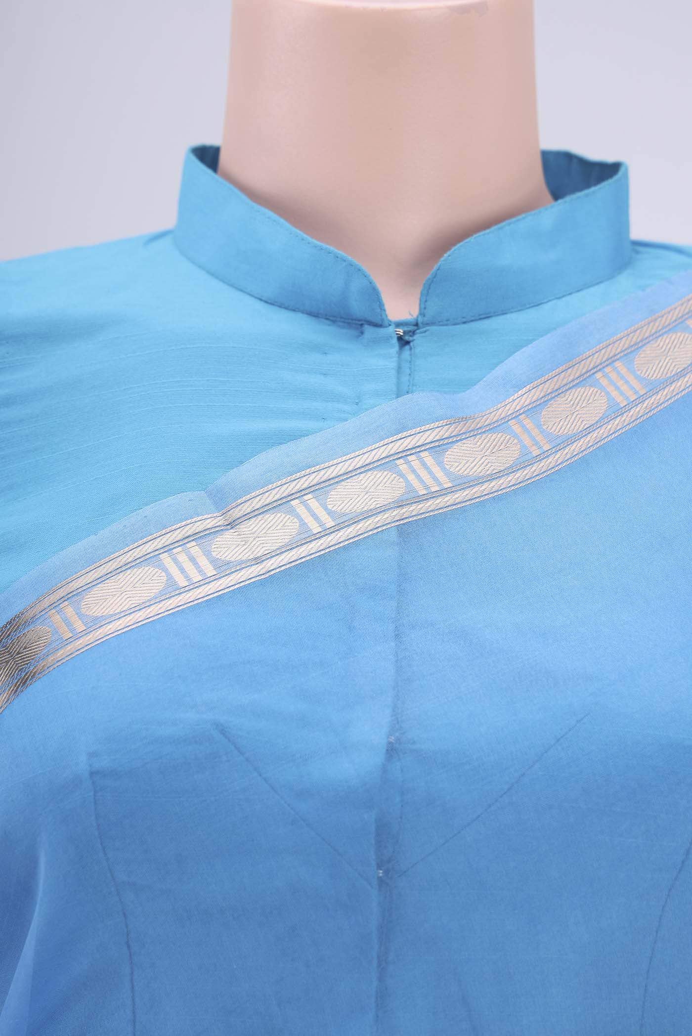 Border image of Blue Organza Silk Saree with Zari Butta on the body and Zari Border. 