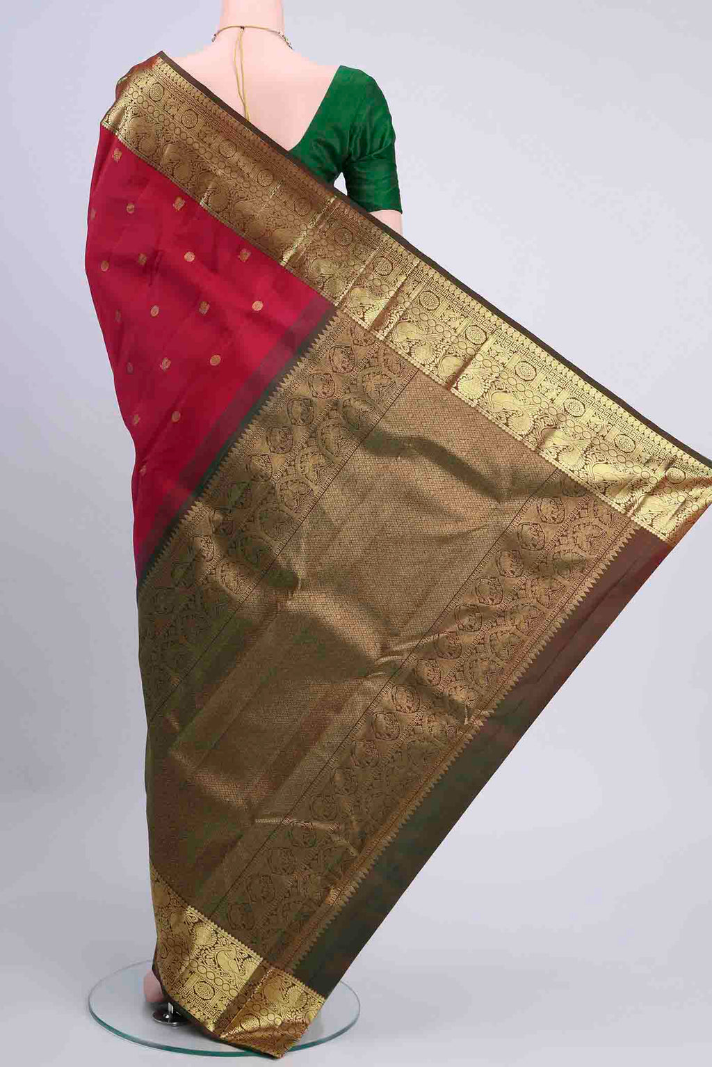 Flat view of Dark Pink Kanchipuram Saree with Zari Butta on the body and Zari Border