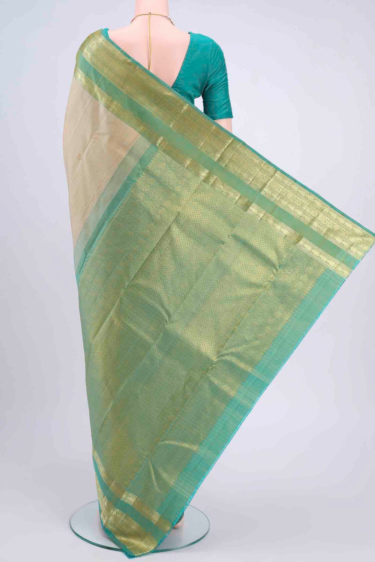 Flat view of Beige Kanchipuram Saree with Checked design on the body and Zari Border