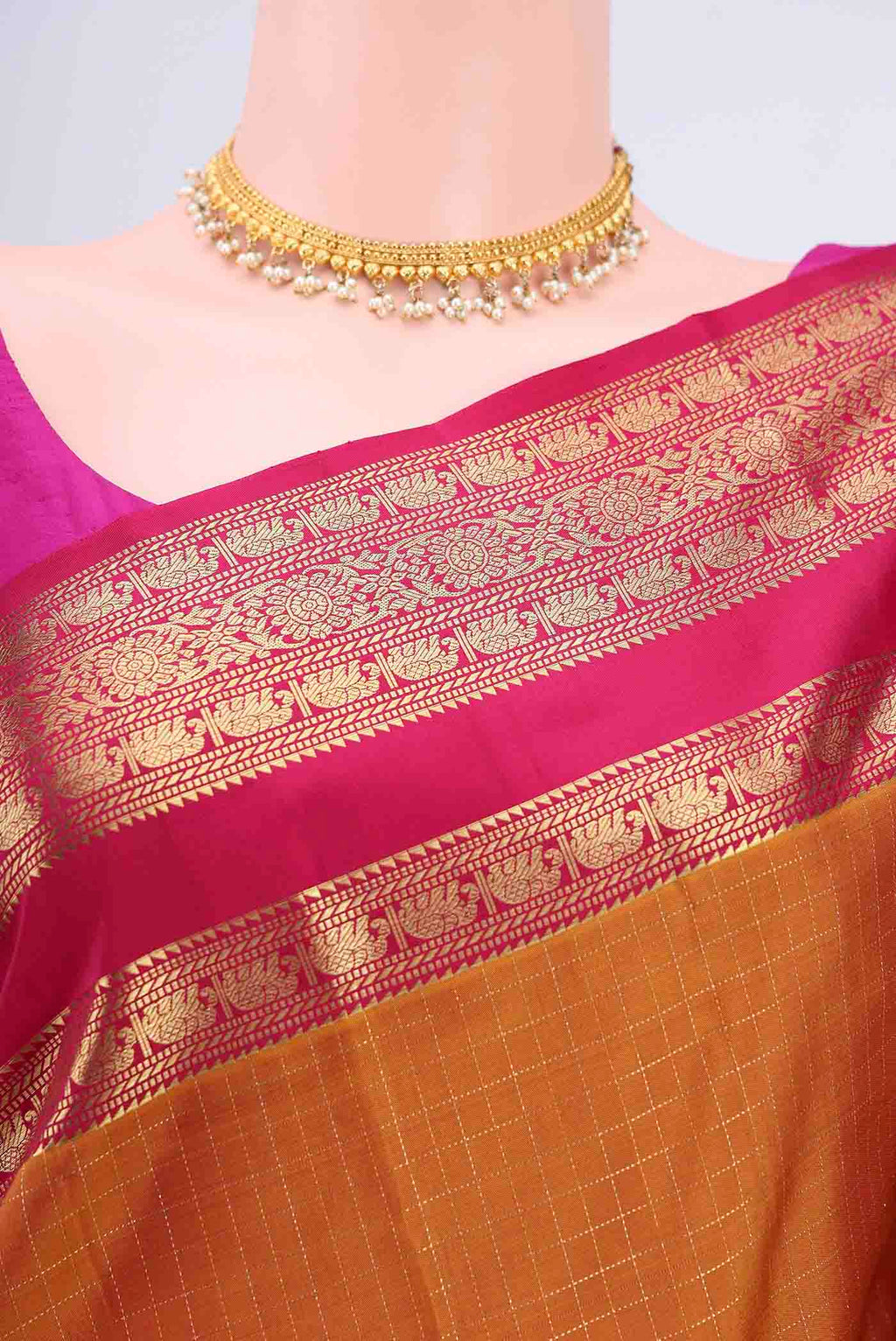 Border image of Mustard Kanchipuram Saree with Checked design on the body and Zari Border