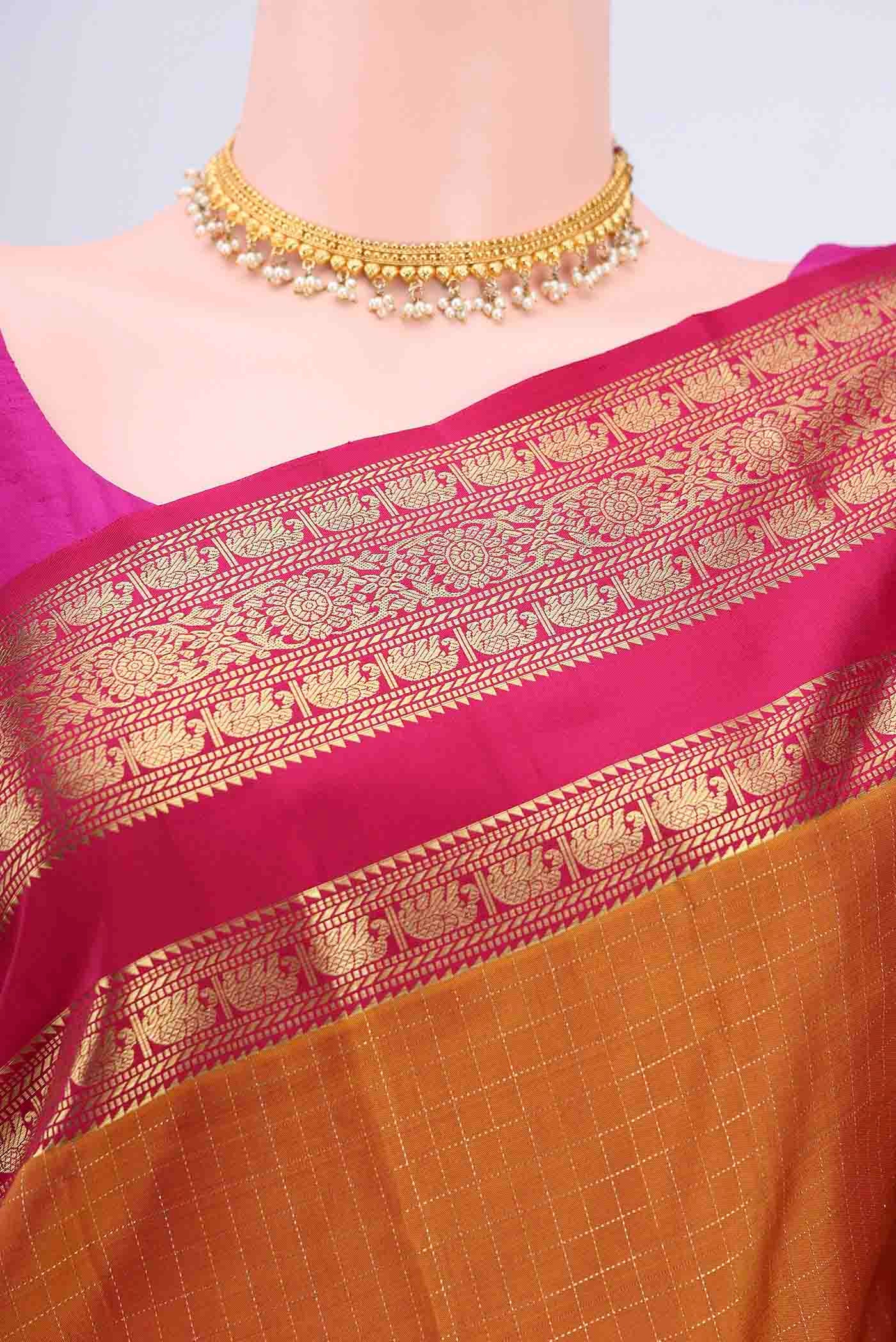 Border image of Mustard Kanchipuram Saree with Checked design on the body and Zari Border