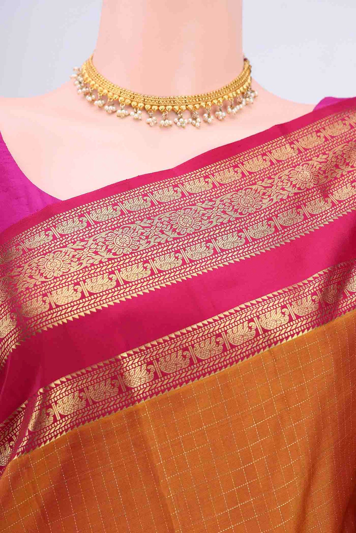 Border image of Mustard Kanchipuram Saree with Checked design on the body and Zari Border