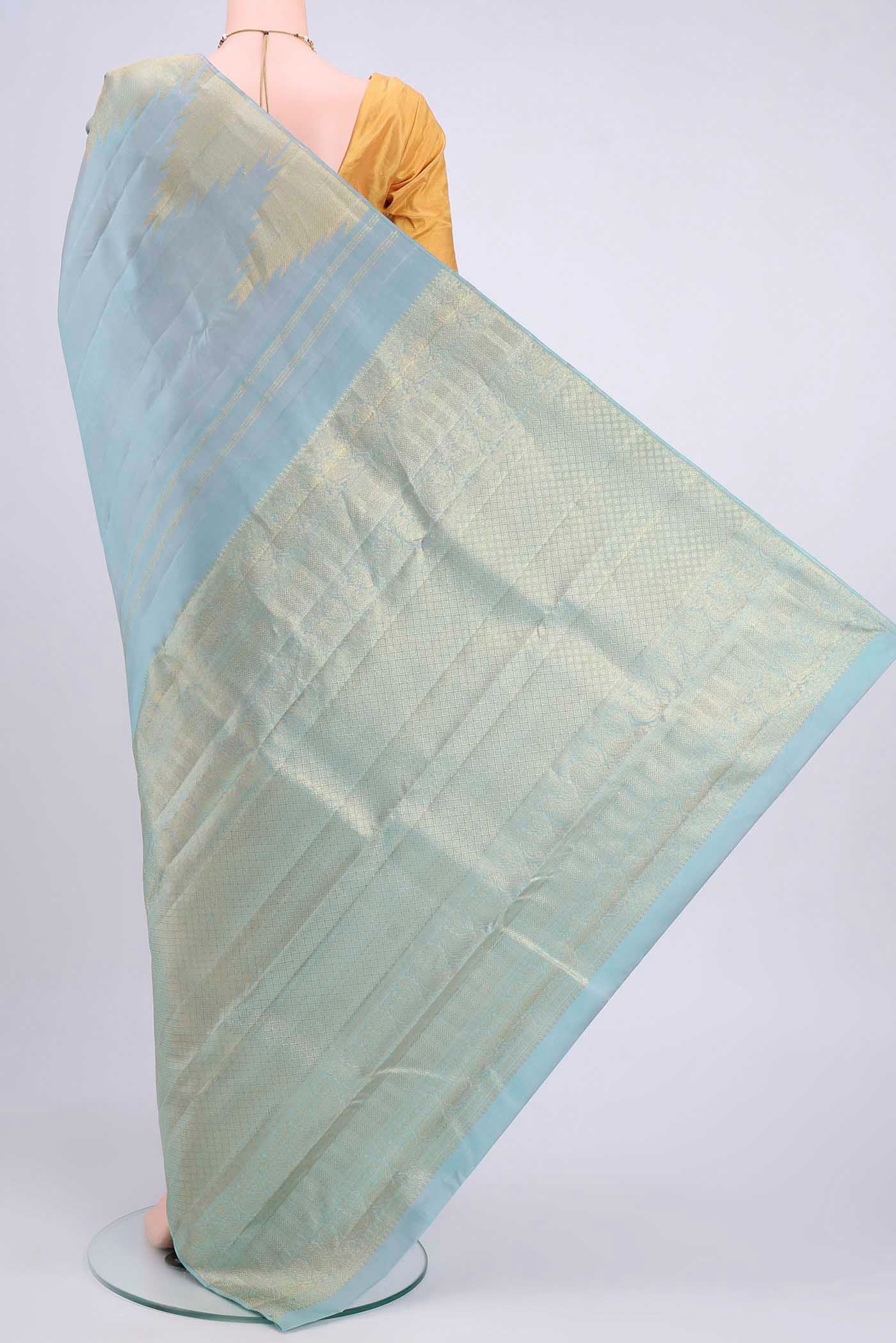 Flat view of Sky Blue Kanchipuram Saree with Plain Body and Temple Border