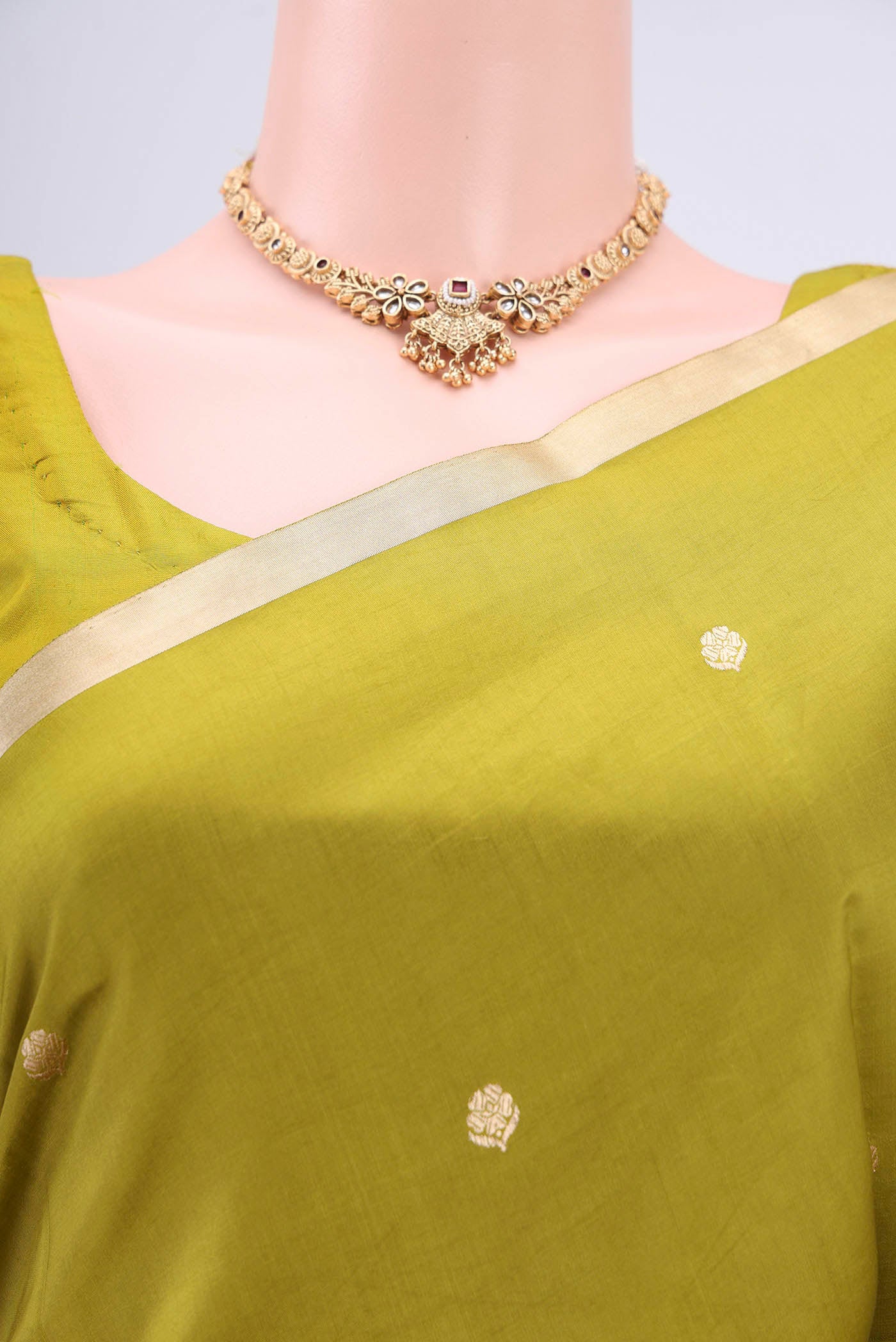 Border image of Parrot Green Banarasi Katan Silk Saree with Zari Butta on the body and Zari Border. 