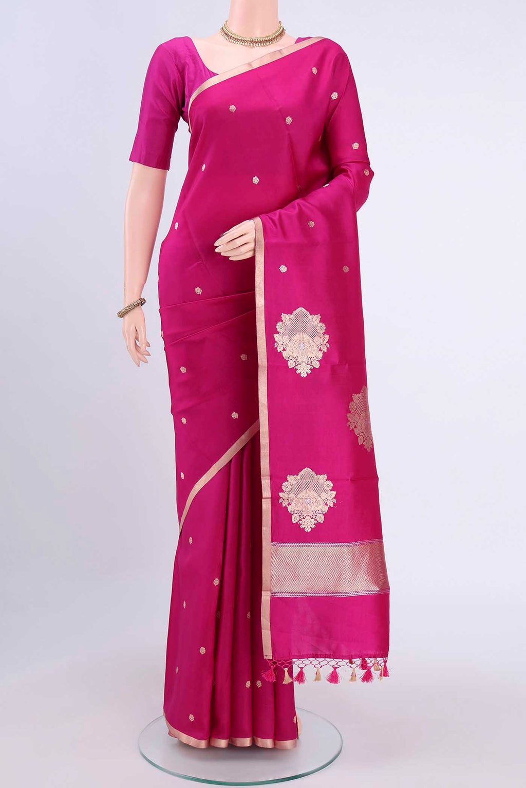 Rani Pink Banarasi Silk Saree with Zari Butta on the body and Thin Zari Line displayed on a mannequin
