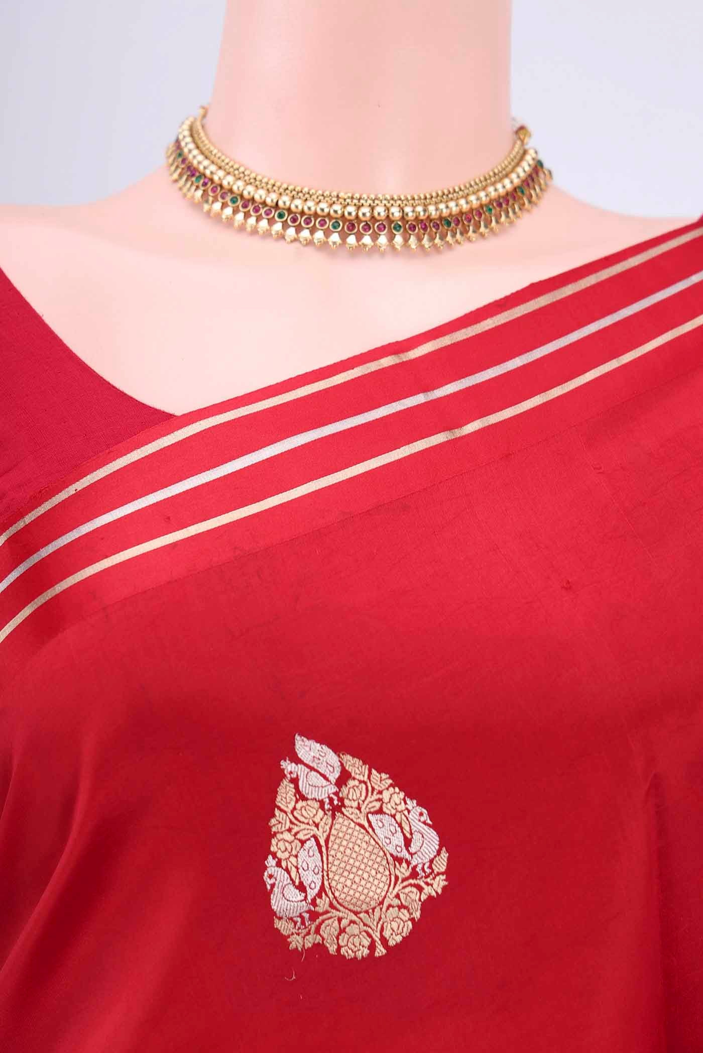 Border image of Red Banarasi Silk Saree with Zari Butta on the body and Satin Border