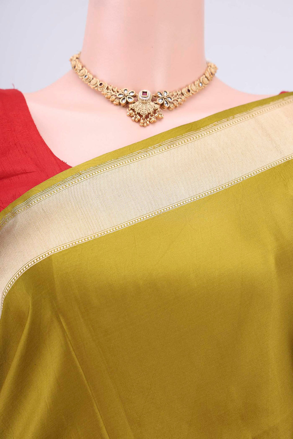 Border image of Mehandi Green Banarasi Silk Saree with Zari Butta on the body and Zari Border. 