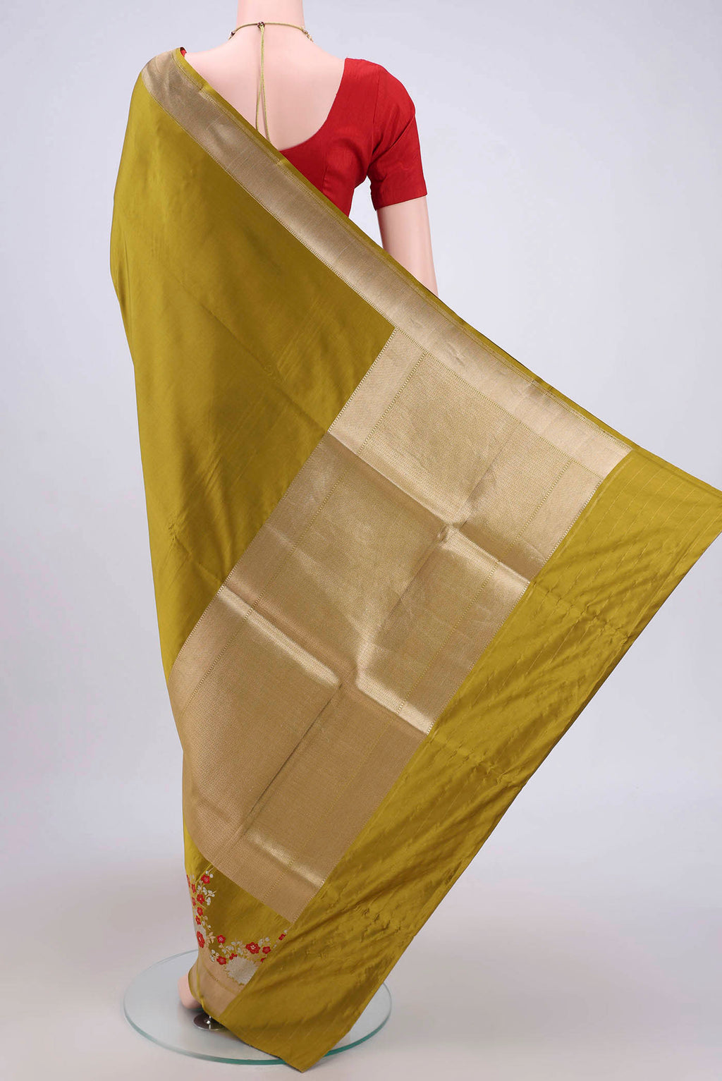 Flat view of Mehandi Green Banarasi Silk Saree with Zari Butta on the body and Zari Border. 