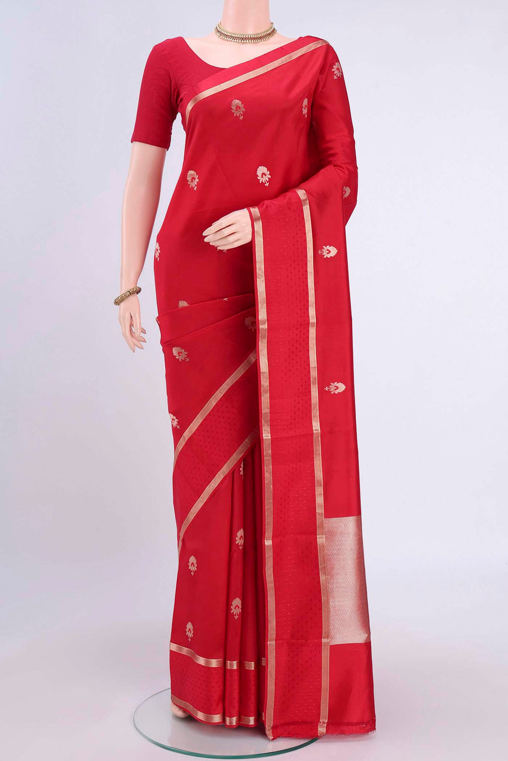 Red Banarasi Silk Saree with Zari Butta on the body and Zari Border displayed on a mannequin