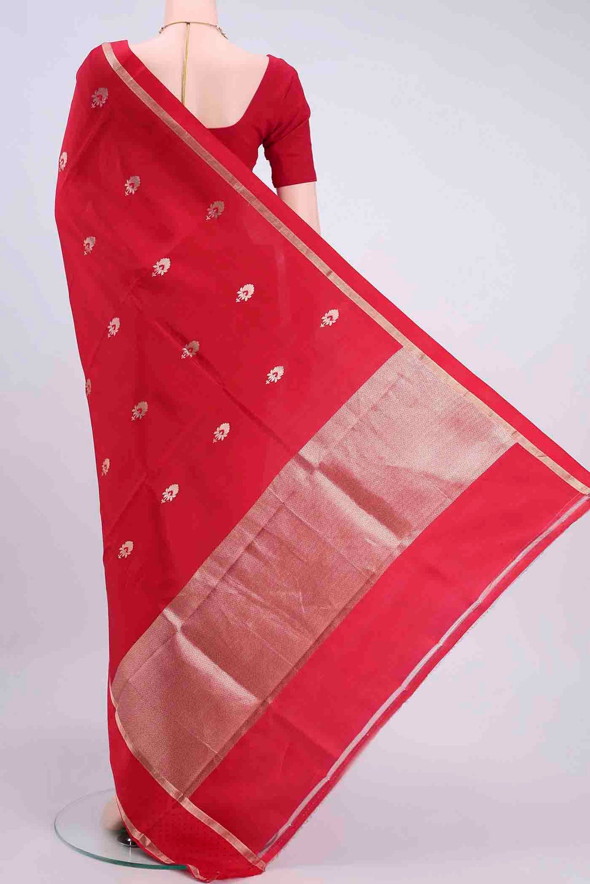 Flat view of Red Banarasi Silk Saree with Zari Butta on the body and Zari Border