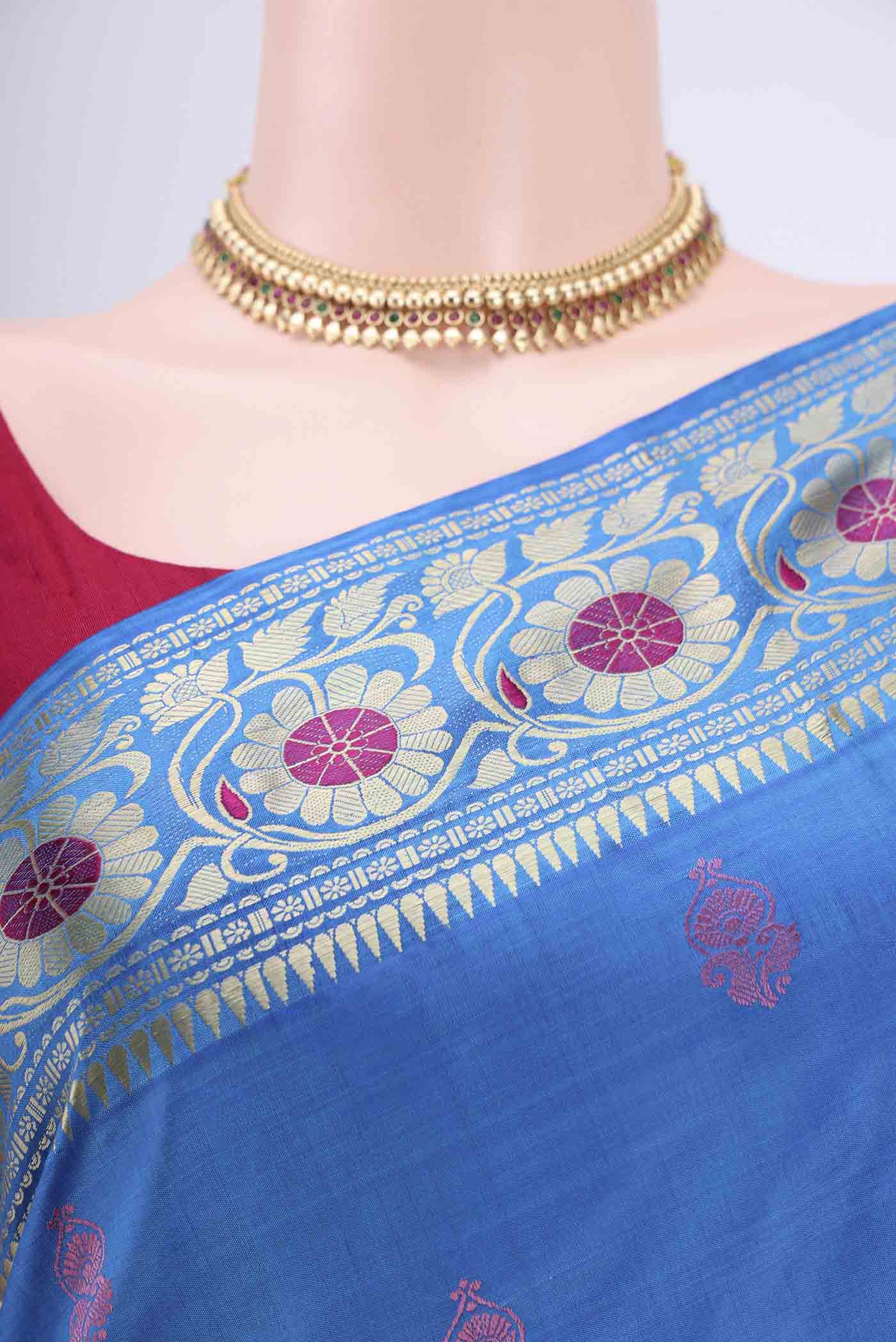 Border image of Blue Dual Tone Baluchari Silk Saree with Thread Butta on the body and Thread Border. 