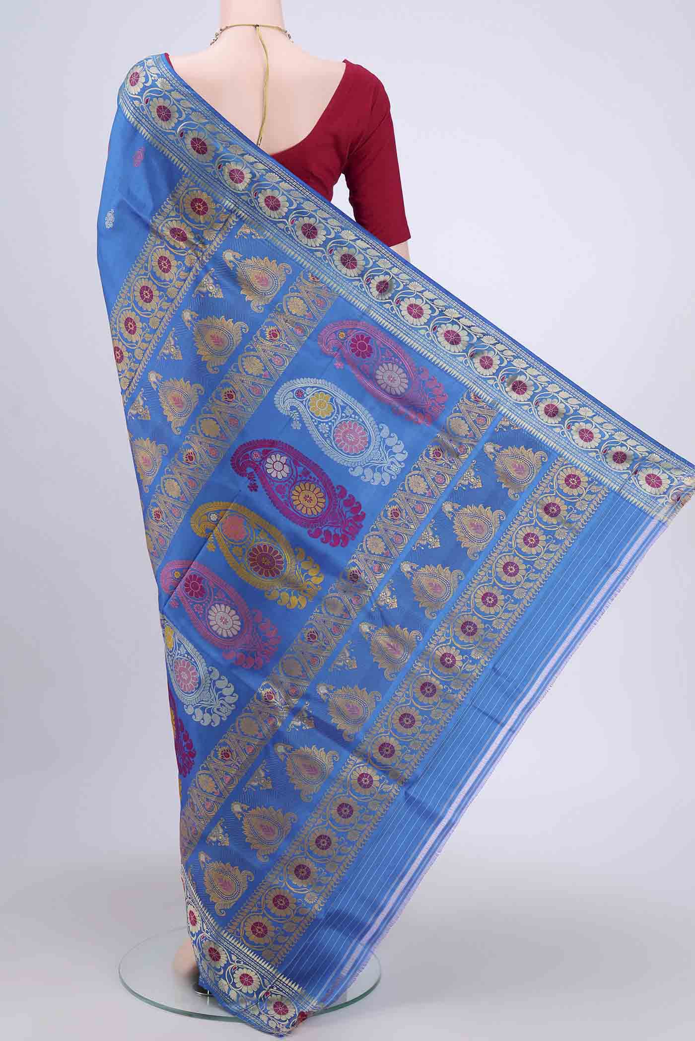 Flat view of Blue Dual Tone Baluchari Silk Saree with Thread Butta on the body and Thread Border. 