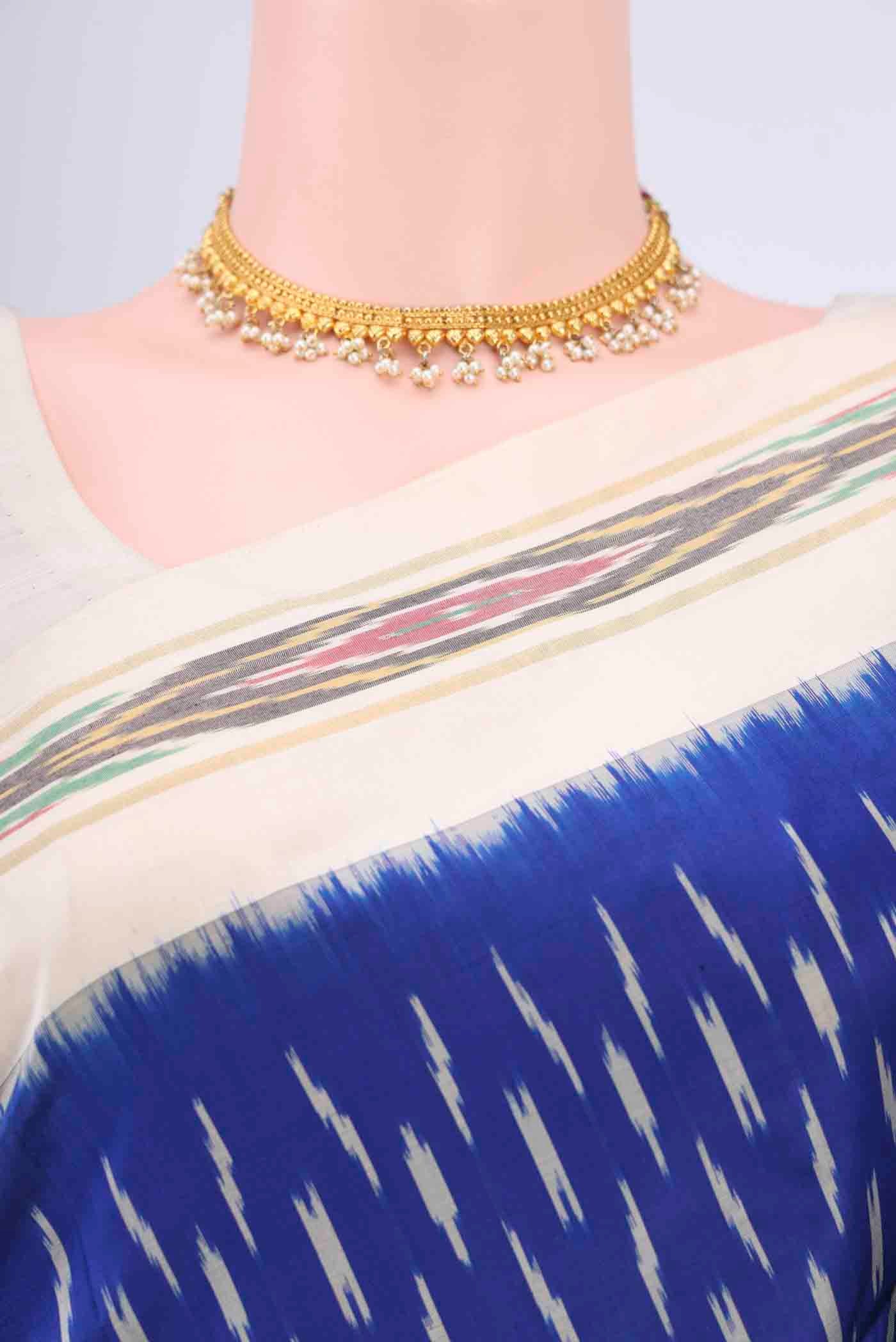 Border image of Dark Blue Pochampally Saree with Ikat design on the body and Ikat Border