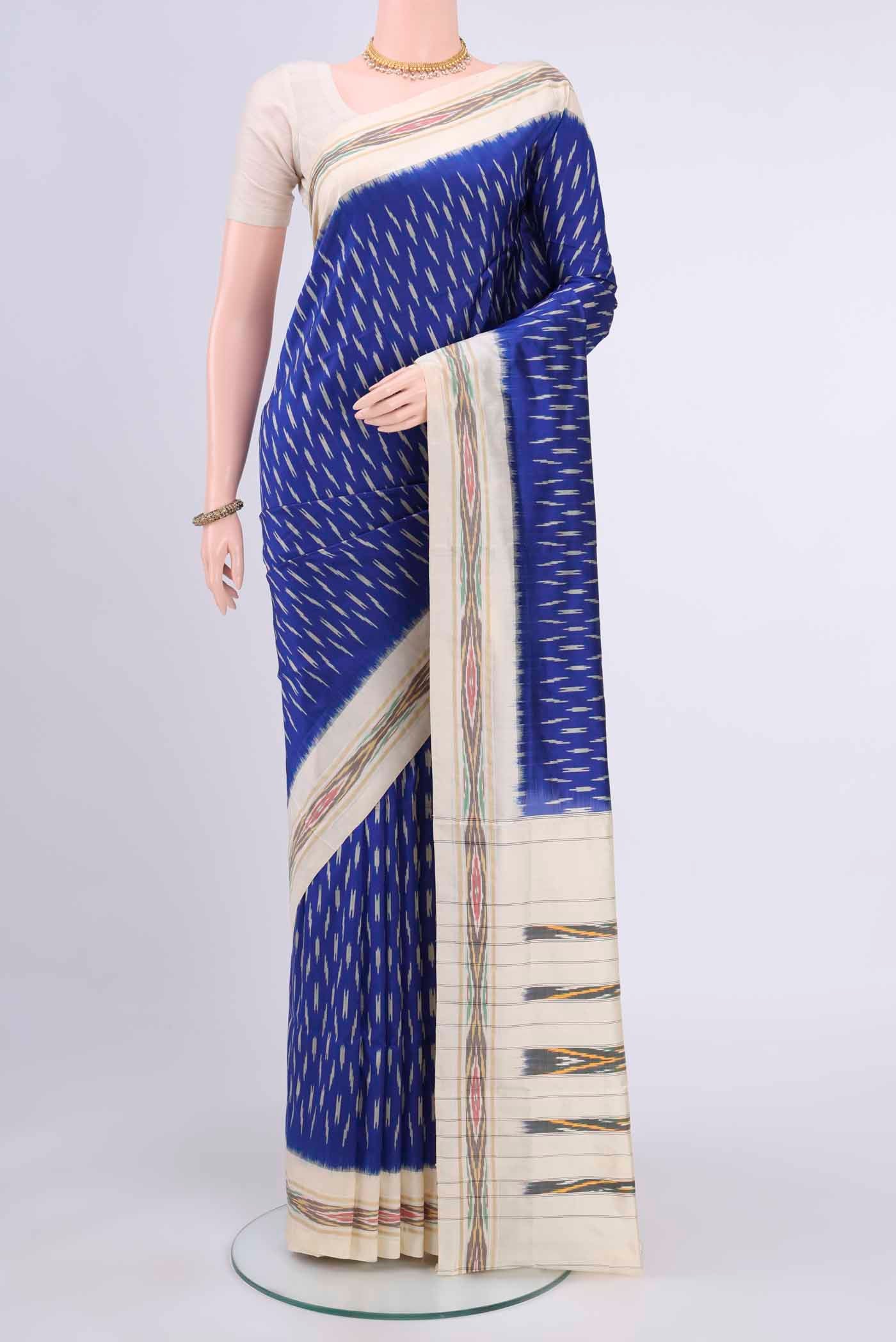 Dark Blue Pochampally Saree with Ikat design on the body and Ikat Border displayed on a mannequin