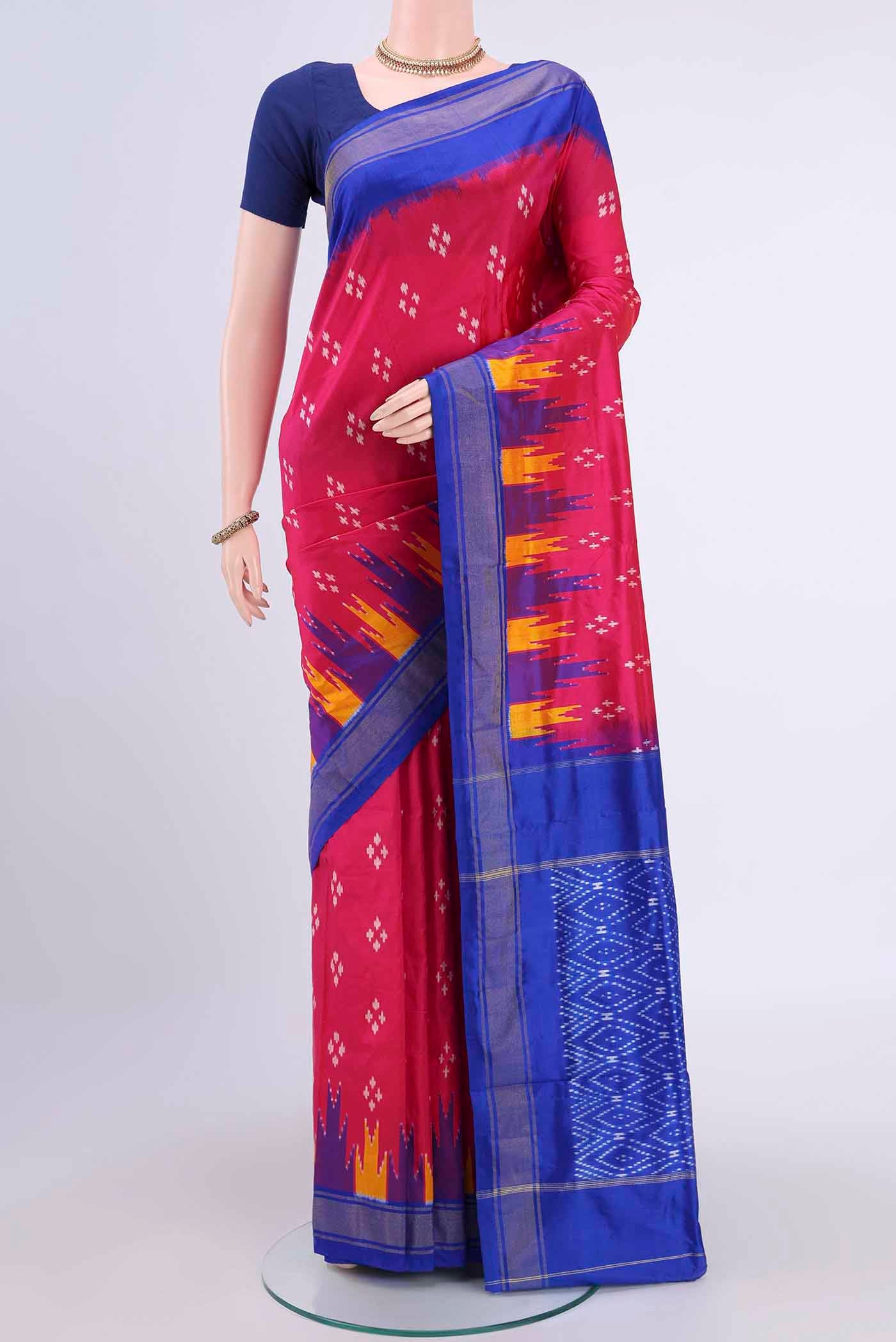 Pink Pochampally Silk Saree with Pure Ikat on the body and Temple Border displayed on a mannequin