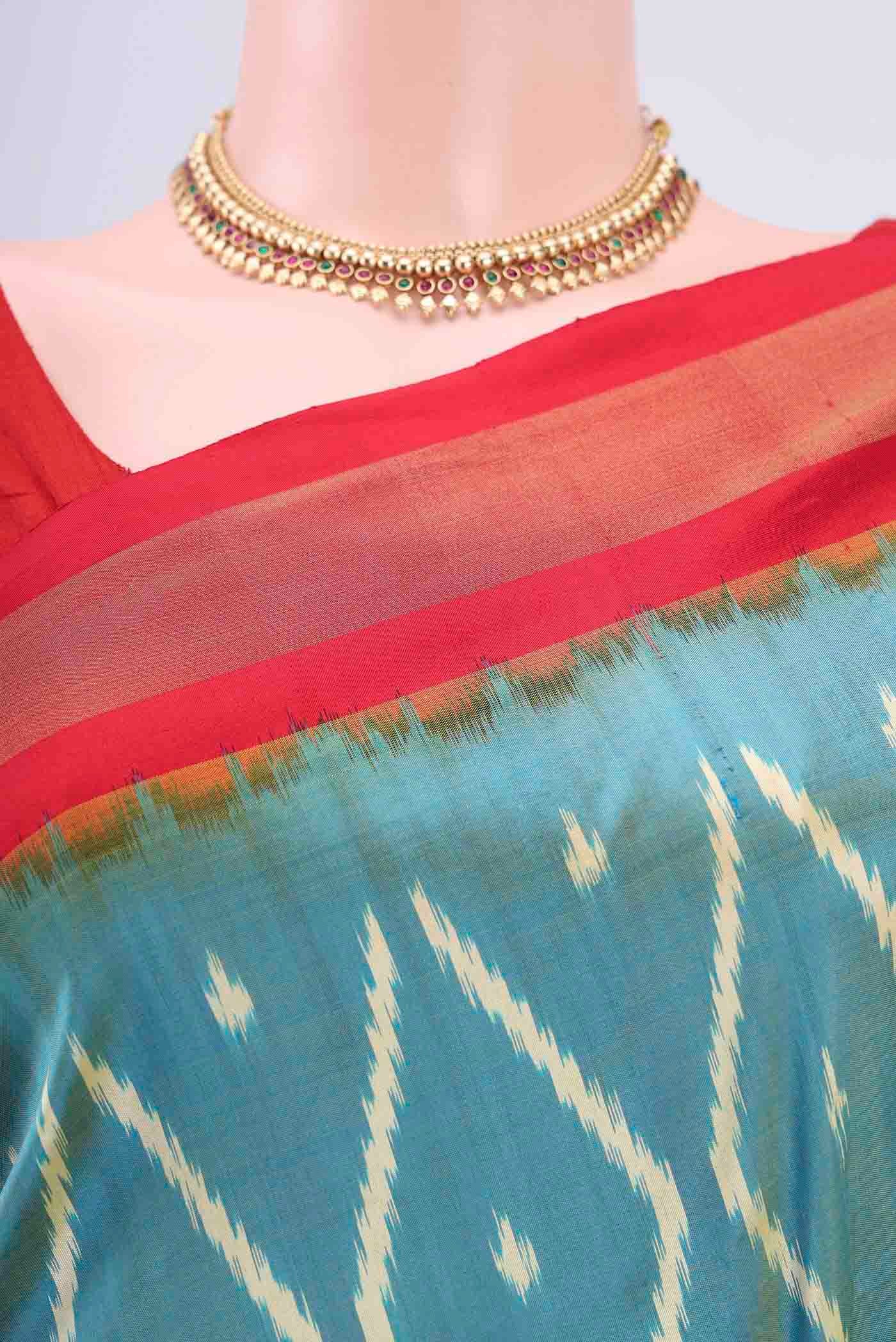 Border image of Light Blue Pochampally Silk Saree with Pure Ikat on the body and Zari Border
