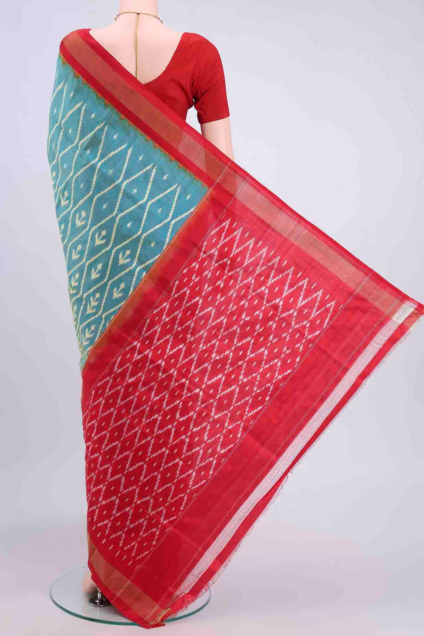 Flat view of Light Blue Pochampally Silk Saree with Pure Ikat on the body and Zari Border