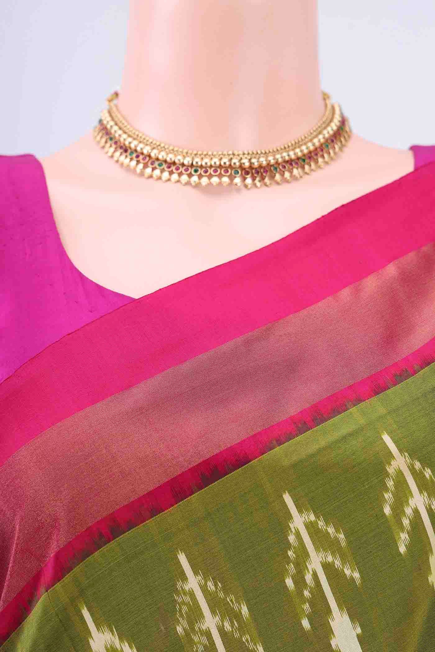 Border image of Mehandi Green Dual Tone Pochampally Silk Saree with Ikat design on the body and Ikat Border