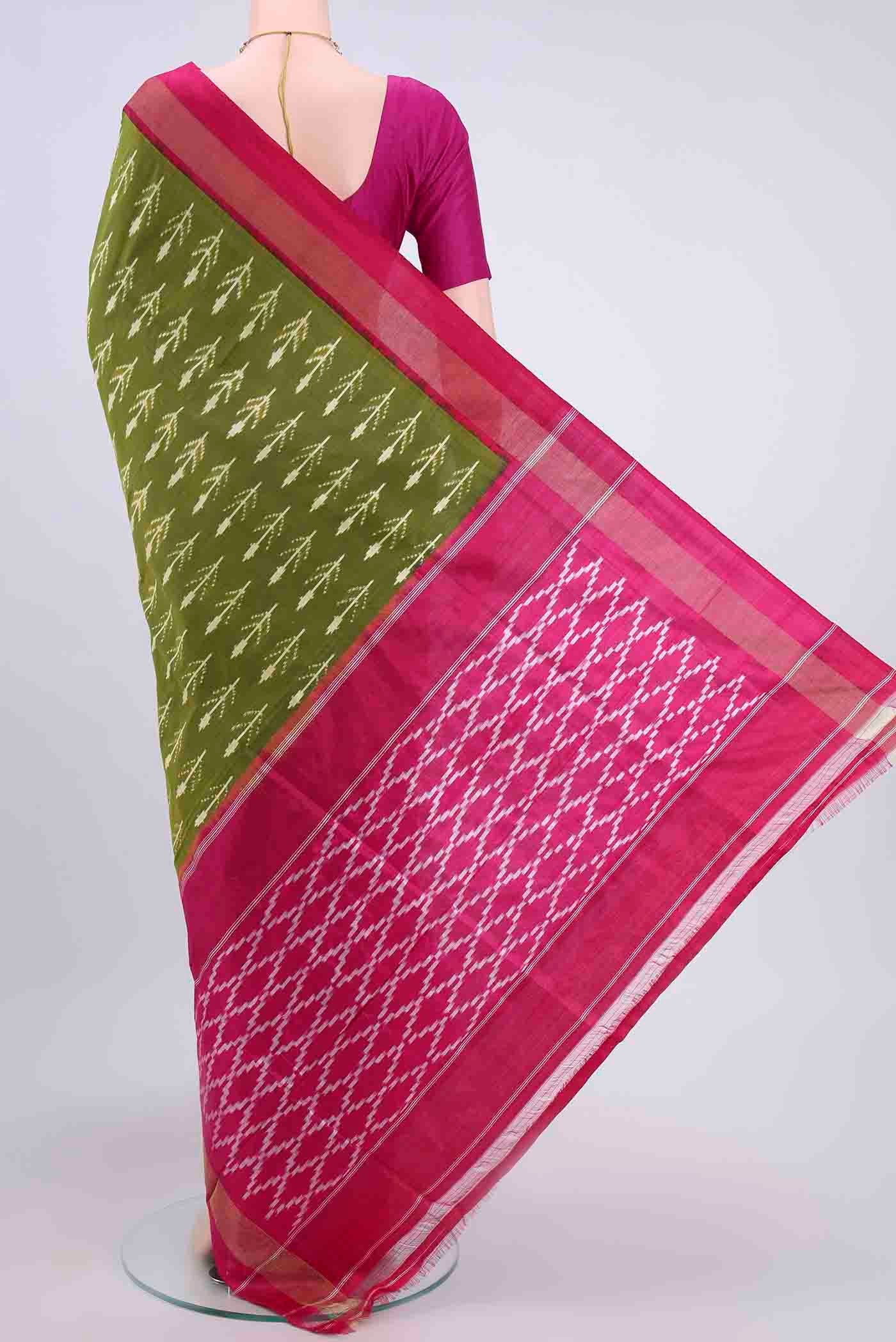Flat view of Mehandi Green Dual Tone Pochampally Silk Saree with Ikat design on the body and Ikat Border