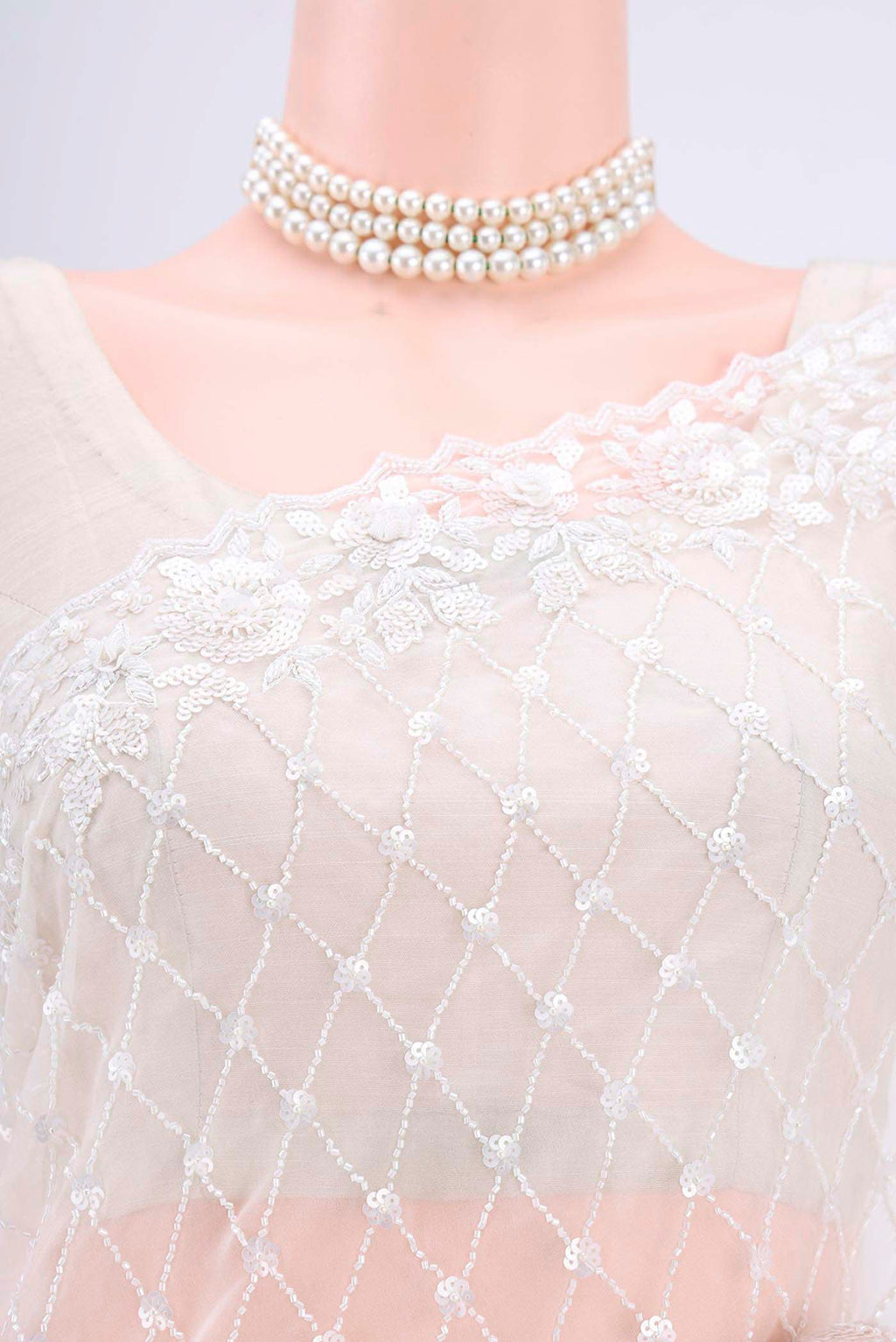 Border image of White Organza Silk Saree with Embroidery on the body and Zari Border. 