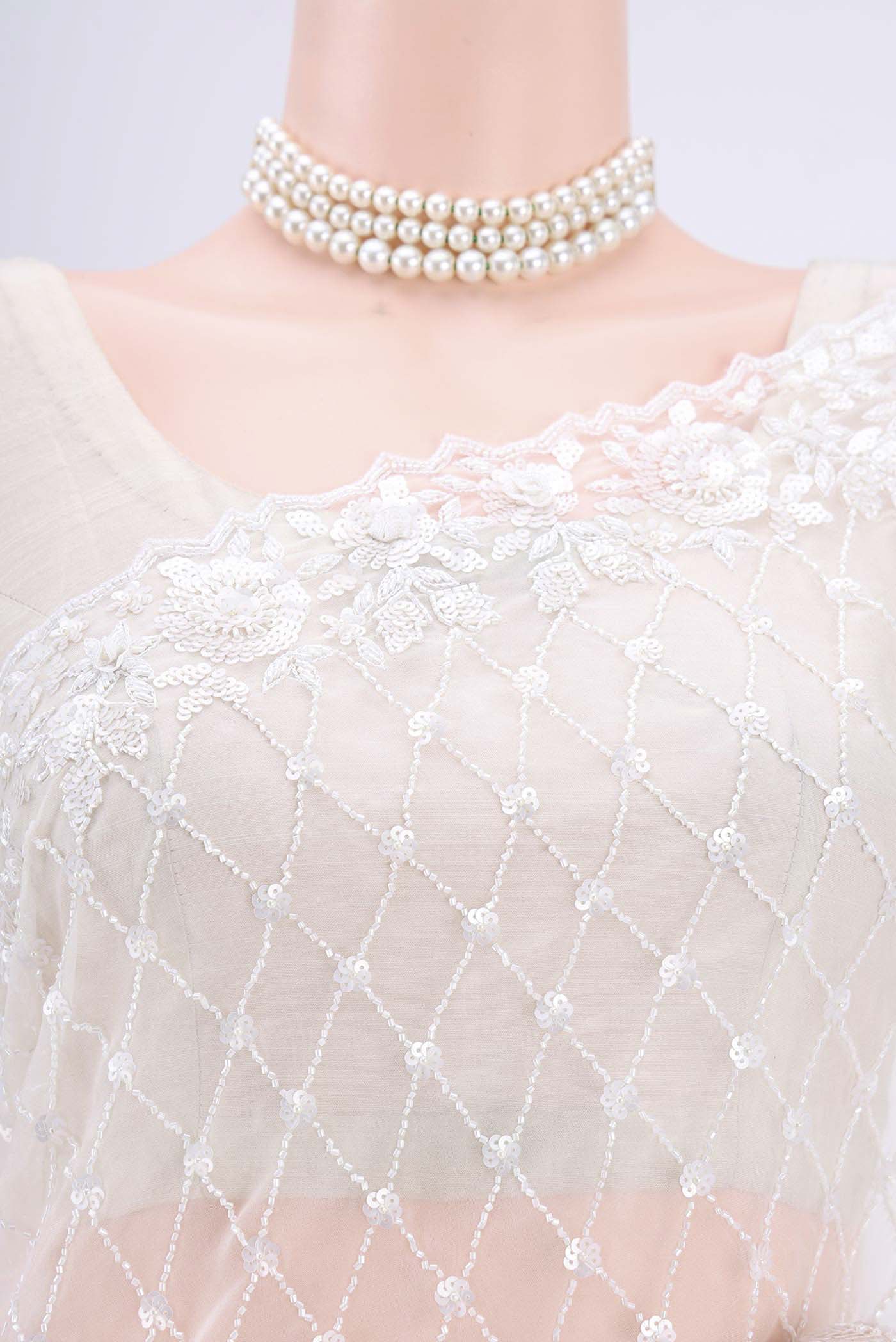 Border image of White Organza Silk Saree with Embroidery on the body and Zari Border. 