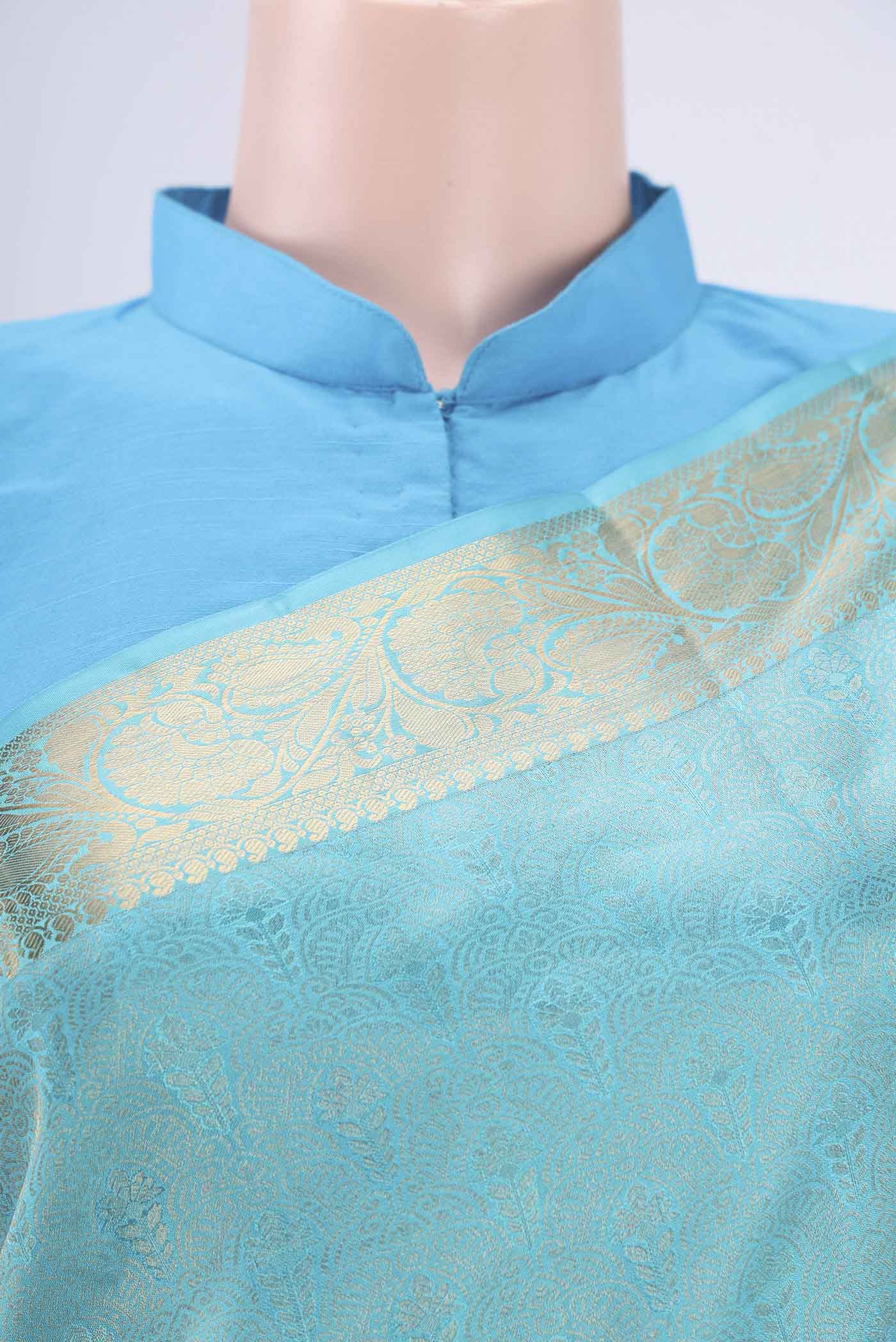 Border image of Turquoise Soft Silk Saree with Zari Brocade on the body and Zari Border. 