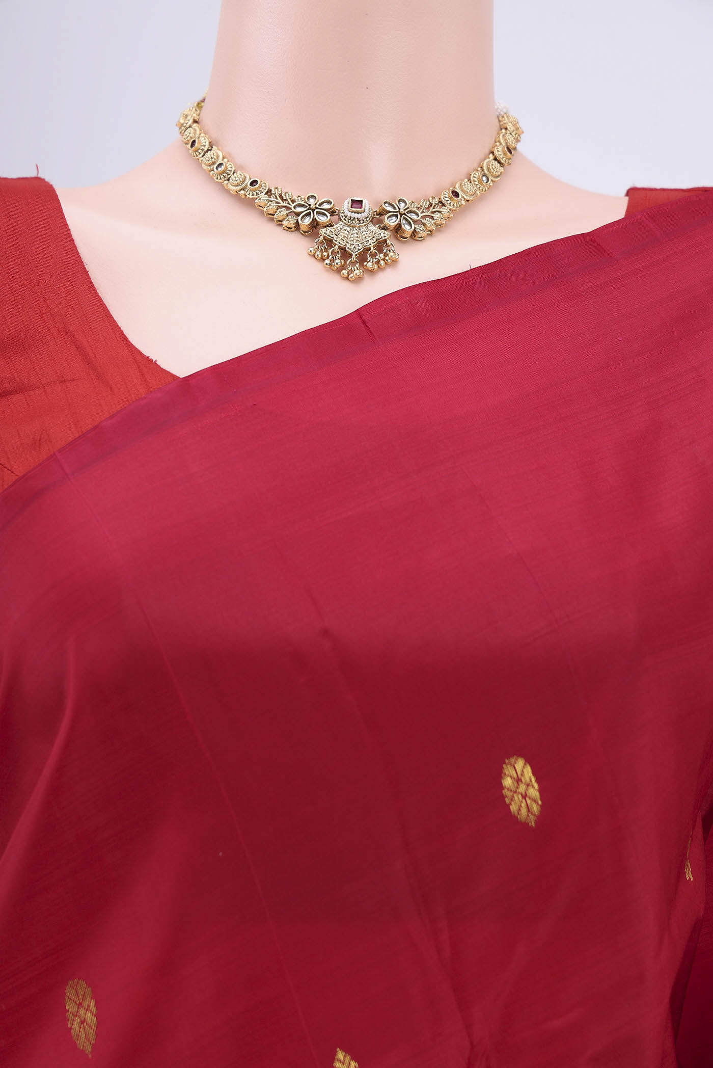 Border image of Maroon Kanjivaram Silk Saree with Zari Butta on the body and One Side Border. 