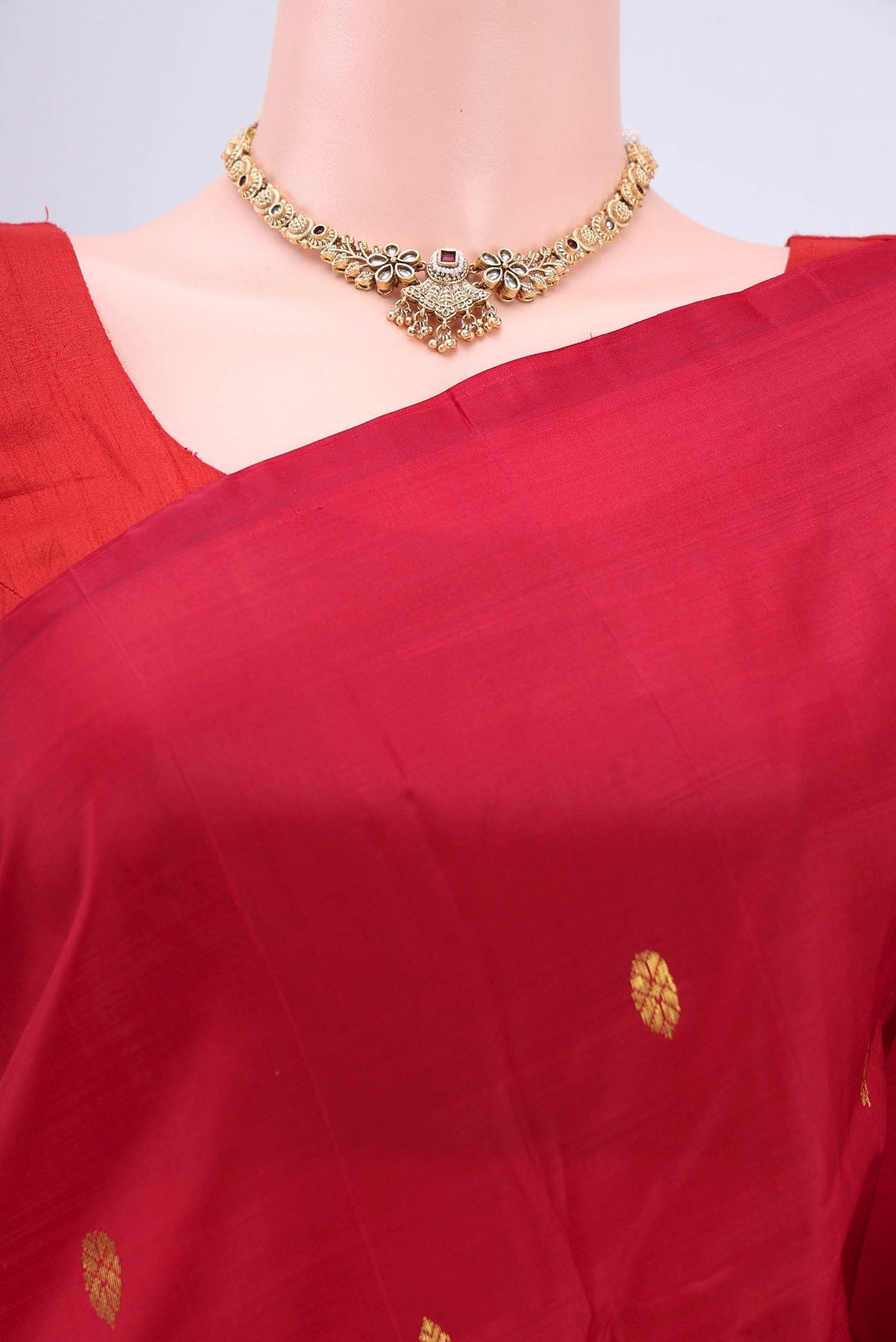 Border image of Maroon Kanjivaram Silk Saree with Zari Butta on the body and One Side Border. 