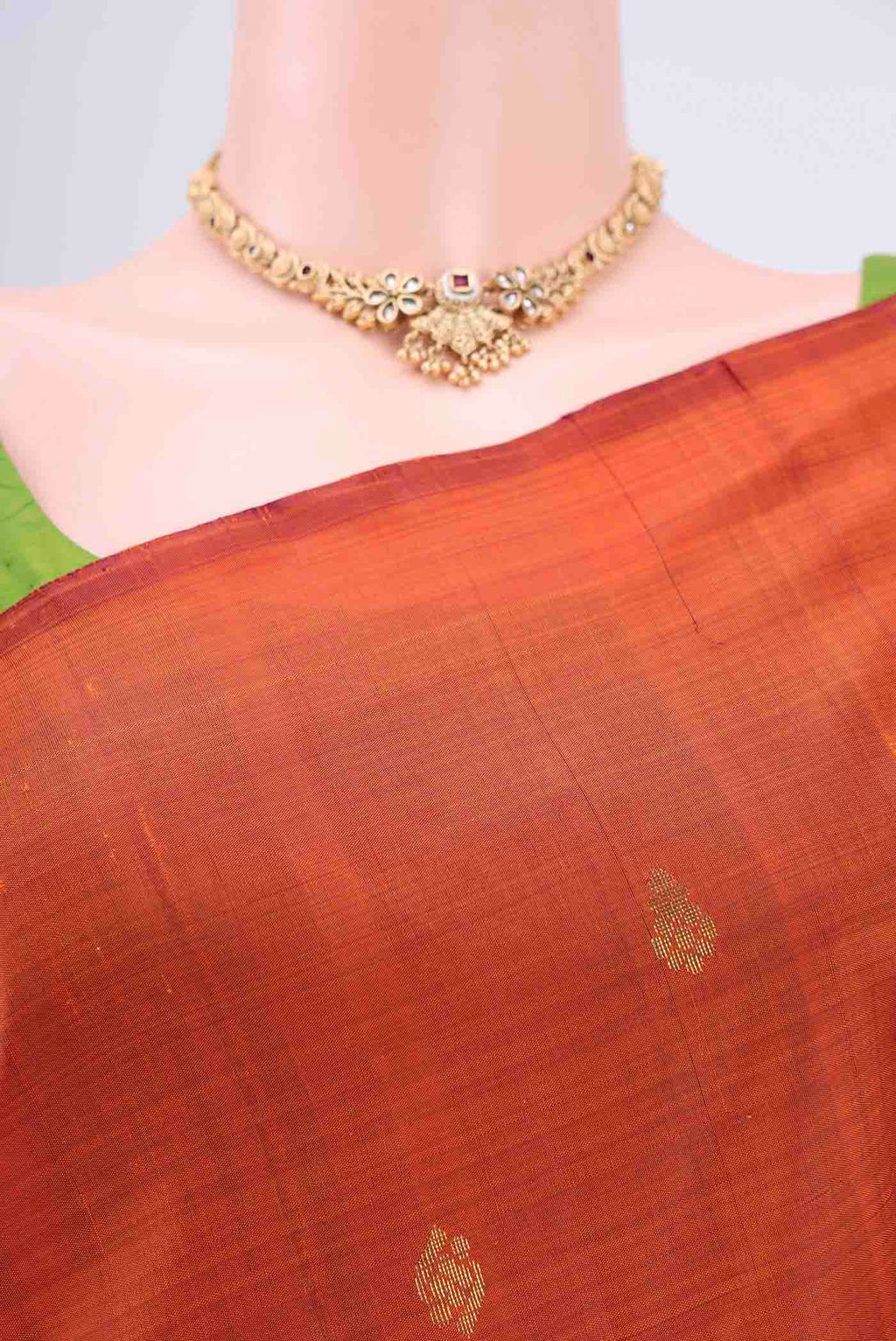Border image of Rust Kanjivaram Silk Saree with Zari Butta on the body and One Side Border. 