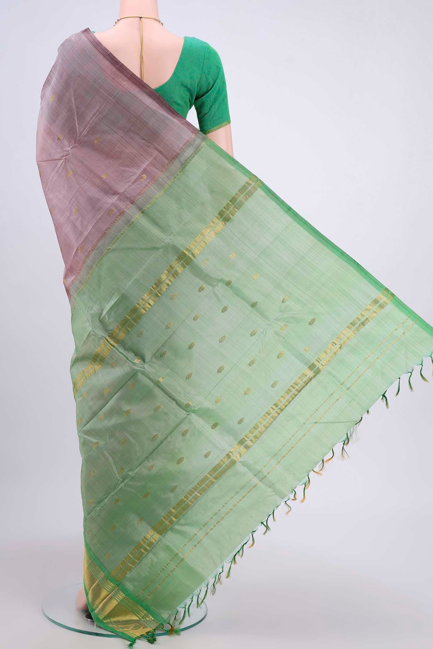 Flat view of Mauve Kanchipuram Silk Saree with Zari Butta on the body and One Side Border