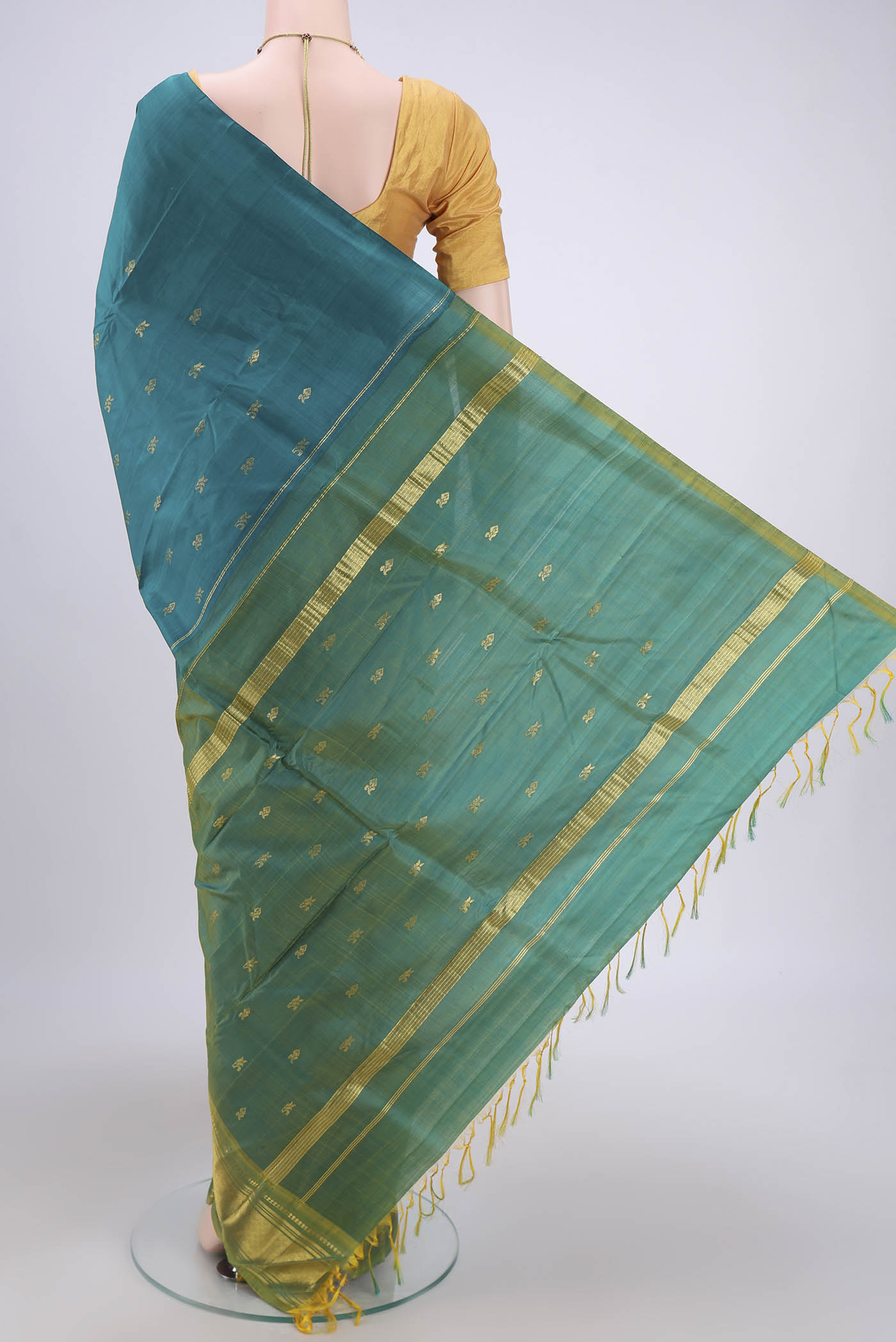 Flat view of Sea Green Kanjivaram Silk Saree with Zari Butta on the body and One Side Border. 