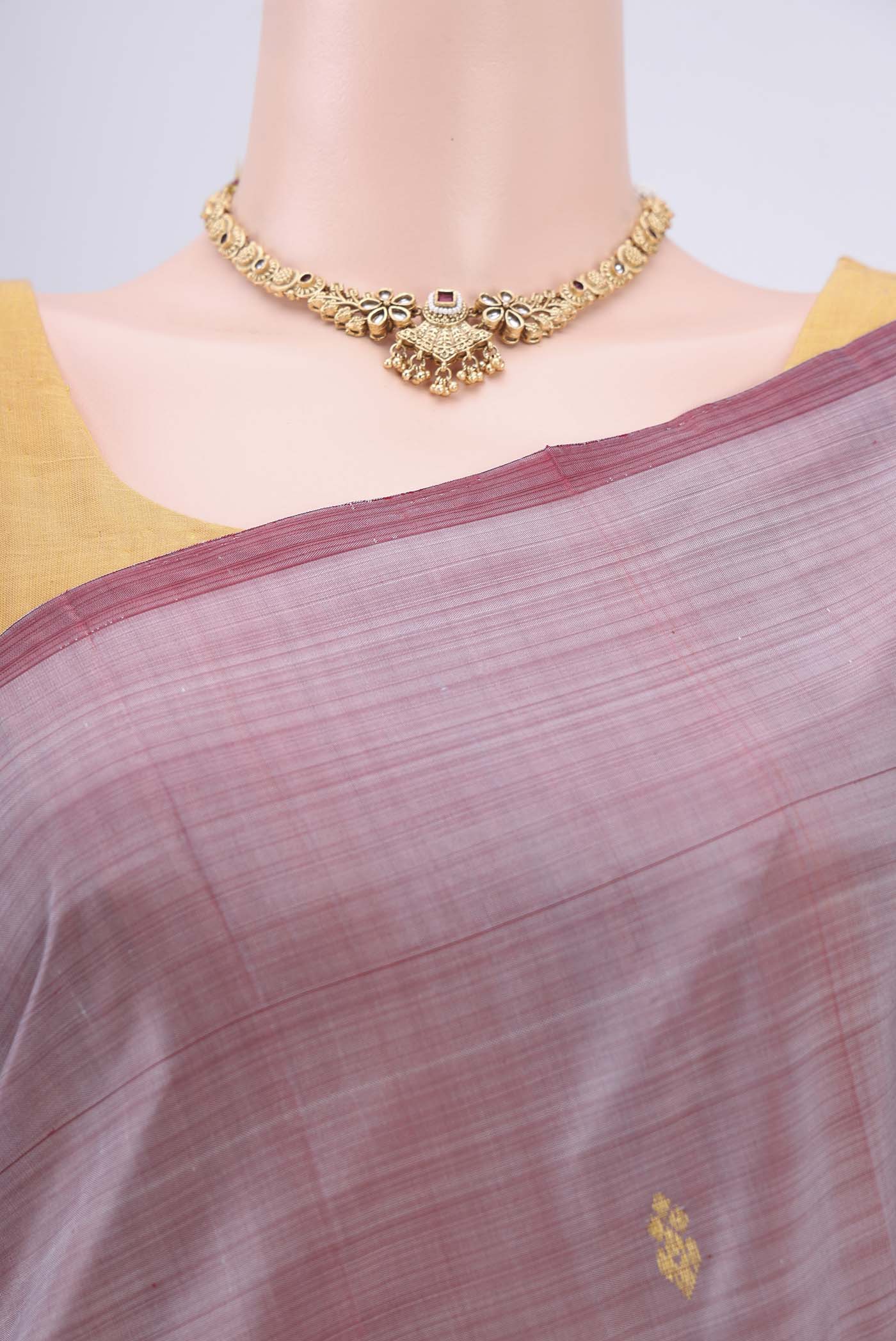 Border image of Coral Kanjivaram Silk Saree with Zari Butta on the body and One Side Border. 