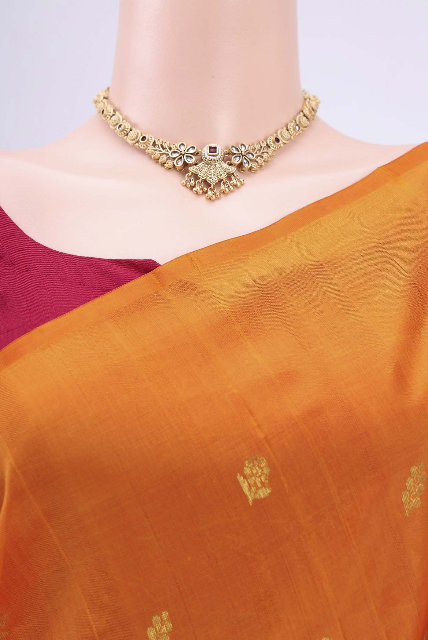 Border image of Orange Kanjivaram Silk Saree with Zari Butta on the body and One Side Border. 