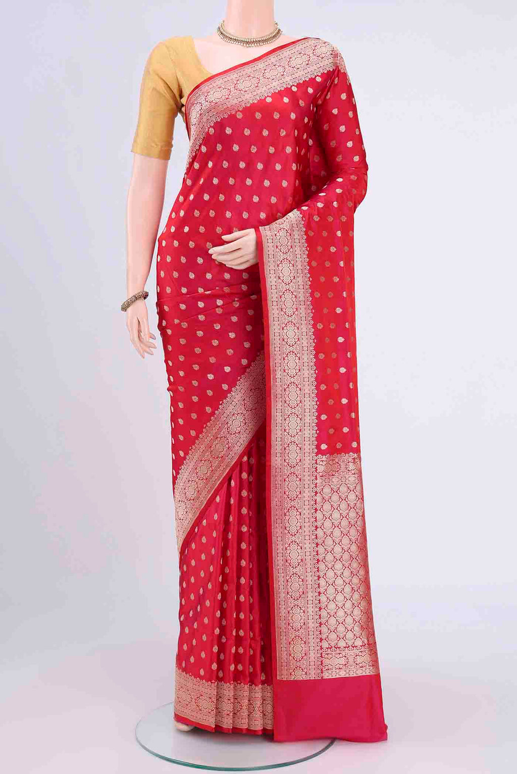 Dark Pink Banarasi Silk Saree with Zari Butta on the body and Zari Border displayed on a mannequin