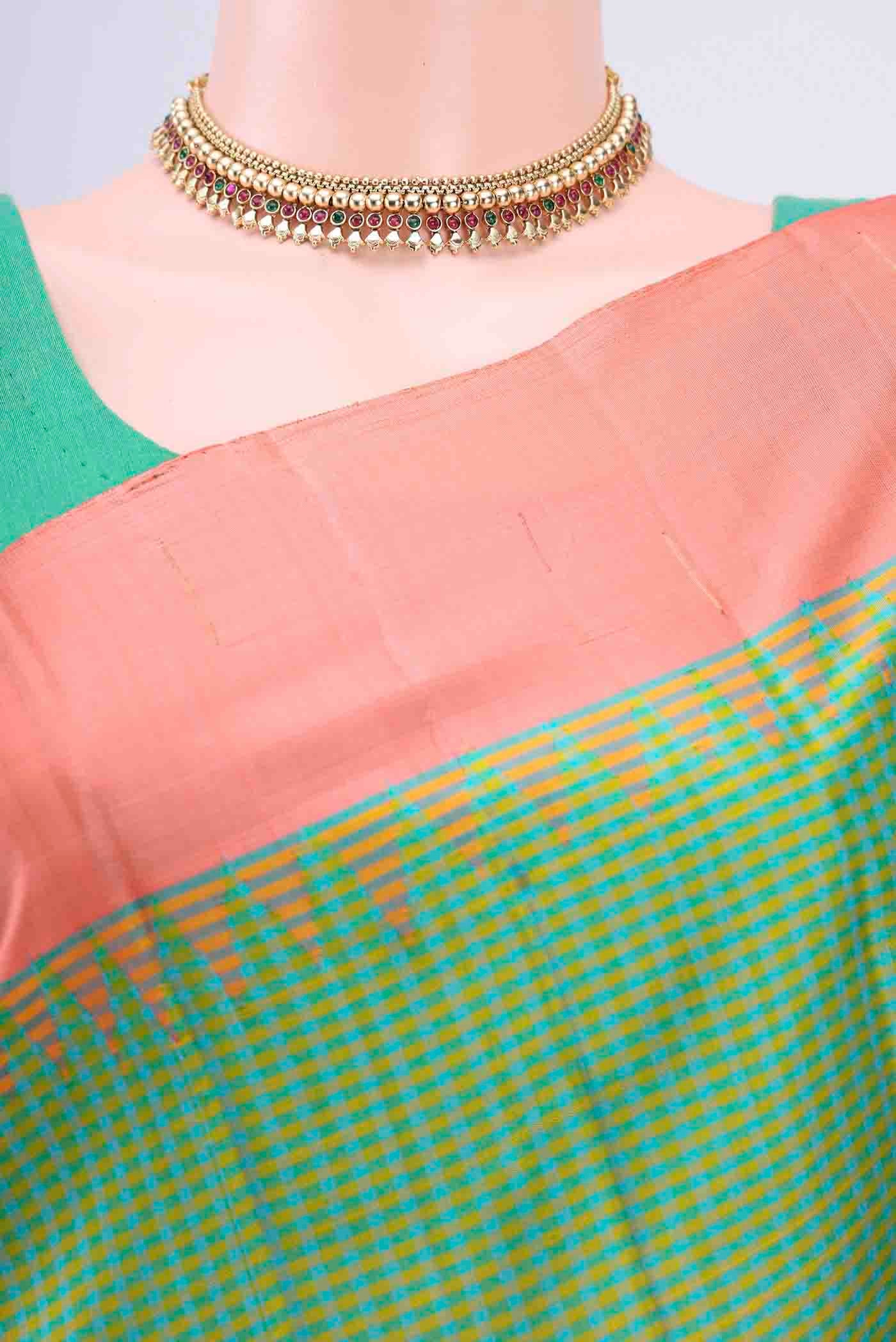 Border image of Green Gadwal Silk Saree with Checked design on the body and Plain Border