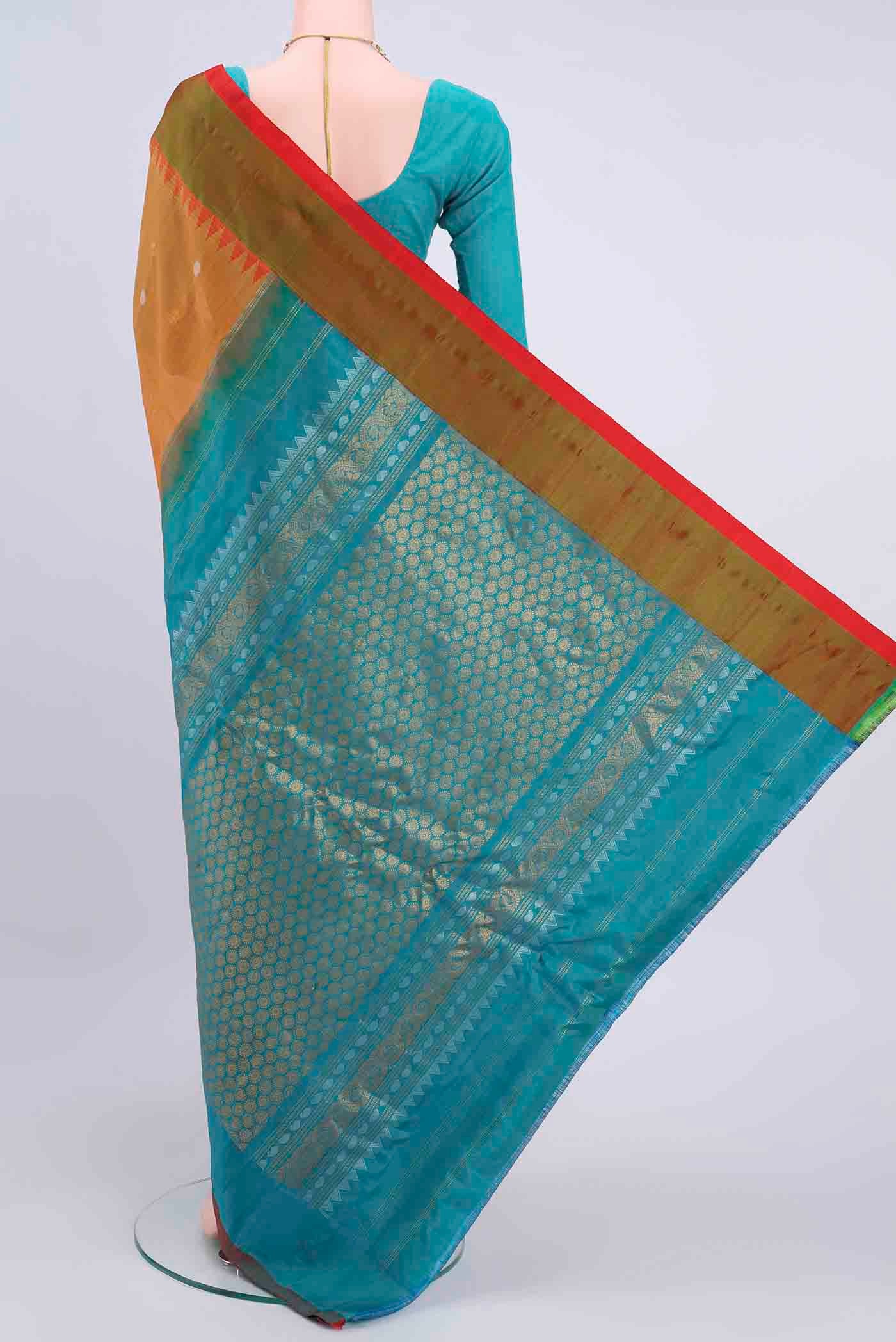 Flat view of Mustard Gadwal Silk Saree with Zari Butta on the body and Plain Border