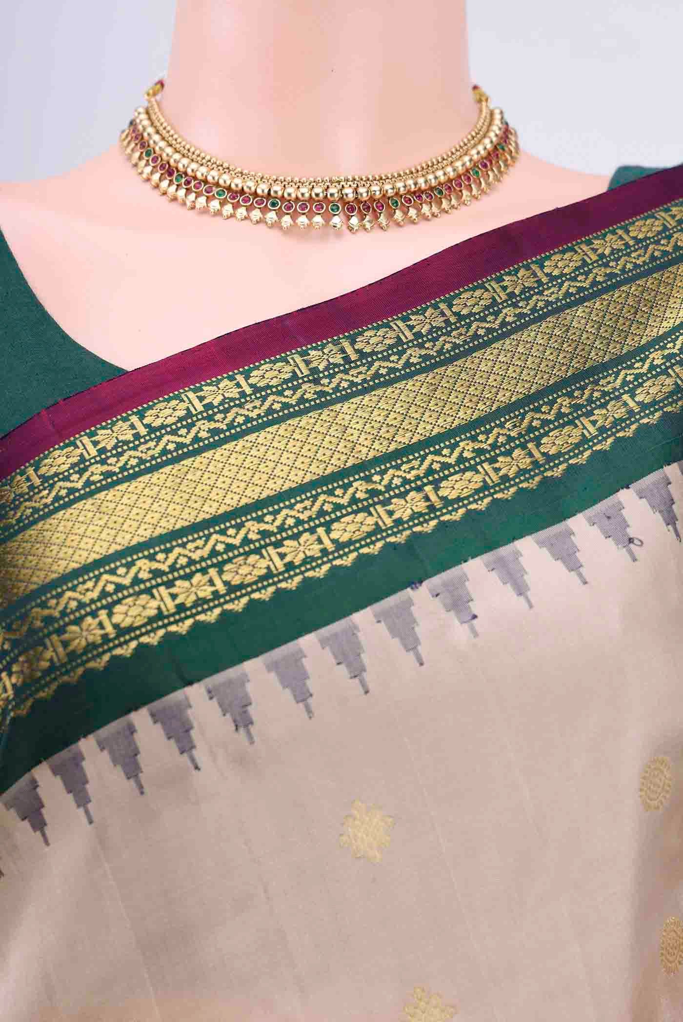 Border image of Beige Dual Tone Gadwal Silk Saree with Zari Butta on the body and Zari Border